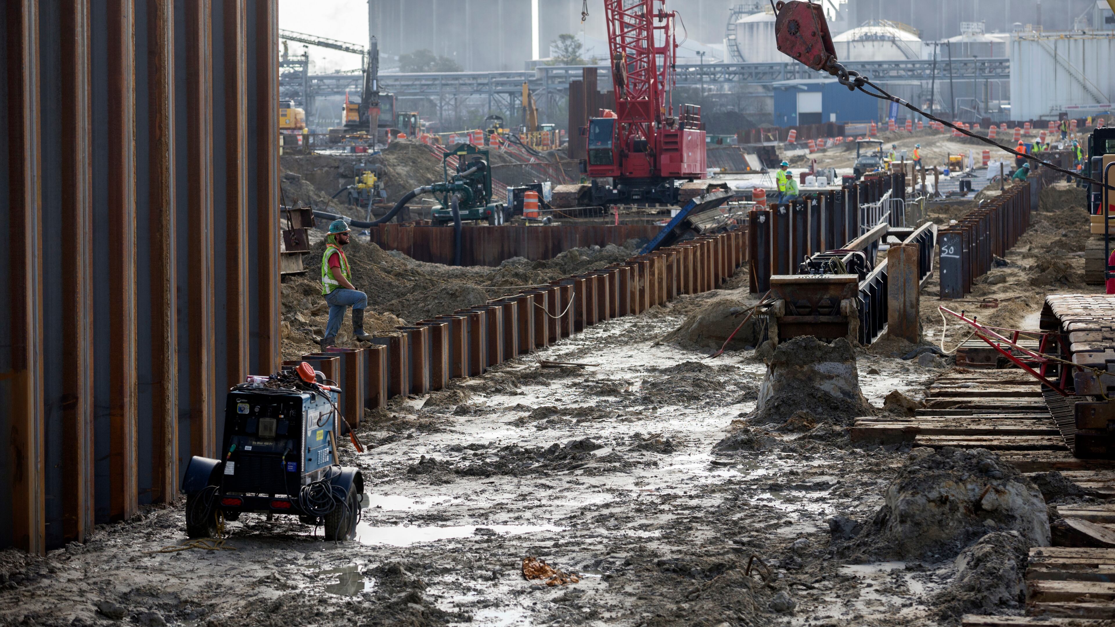 Contractors working for the Georgia Ports Authority recently rebuilding a berth at the Garden City Terminal in Savannah to accommodate larger ships. The authority has also recently coordinated with the U.S. Department of Transportation to increase rail capacity and open inland container yards. (2021 file photo) (AJC Photo/Stephen B. Morton)
