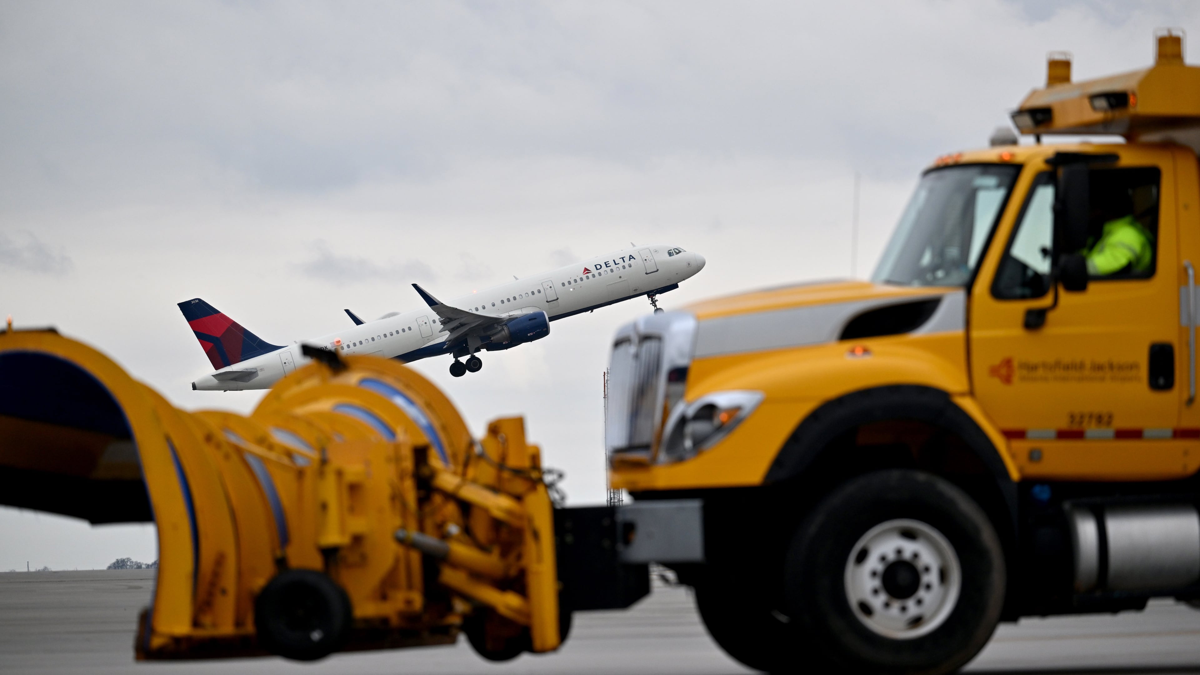 Crews prepare for this weekend’s winter weather event at Hartsfield-Jackson Atlanta International Airport’s South Deicing Facility on Friday, Jan. 23, 2026. As a winter storm barrels across the U.S., airport officials say they’re prepared to keep operations up and running. (Hyosub Shin/AJC)