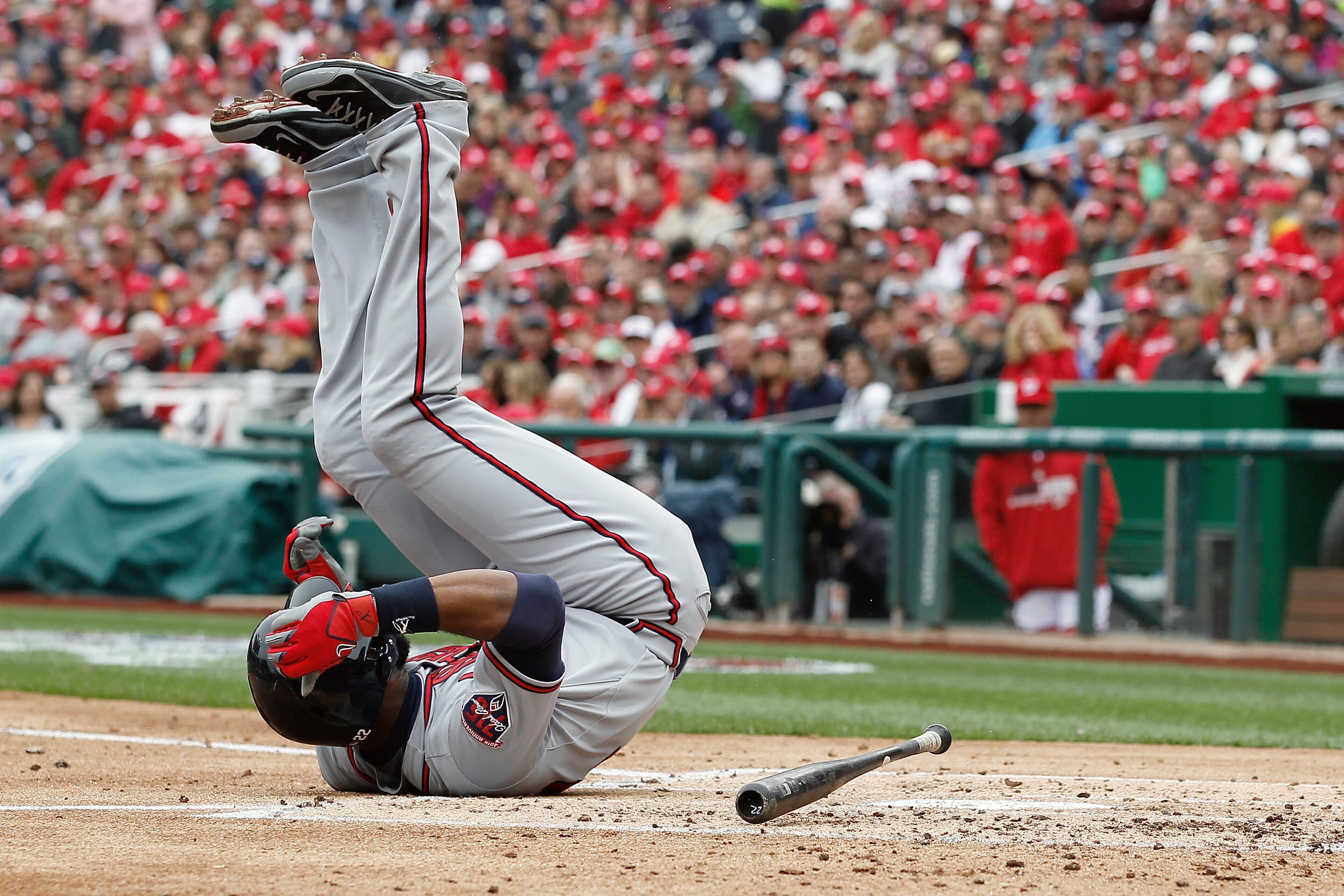 Atlanta Braves right fielder Jason Heyward (22) is hit by a pitch from Washington Nationals starting pitcher Jordan Zimmermann during the third inning of a baseball home opener at Nationals Park Friday, April 4, 2014, in Washington. (AP Photo/Alex Brandon)