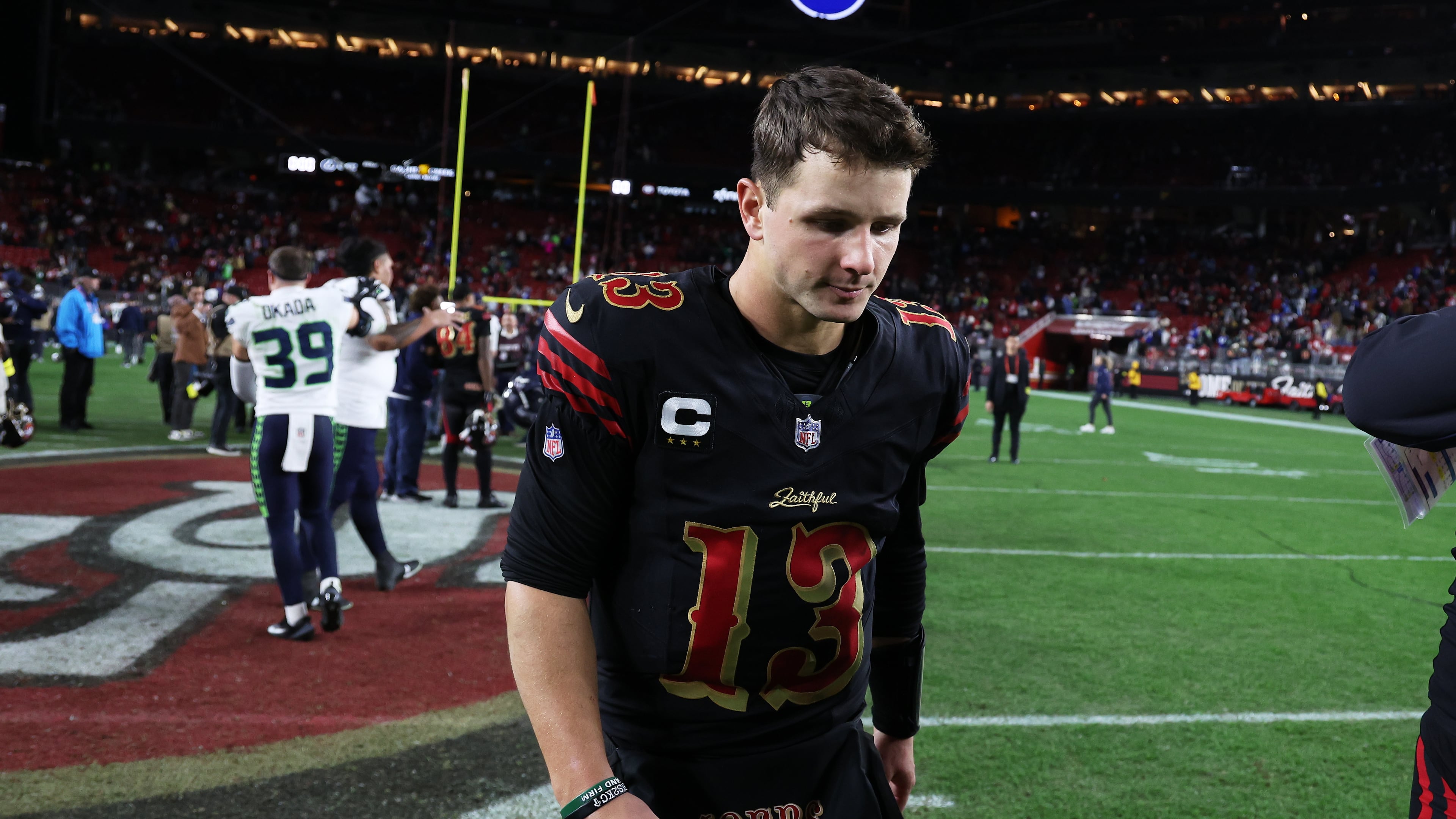 San Francisco 49ers quarterback Brock Purdy (13) walks off the field after an NFL football game against the Seattle Seahawks in Santa Clara, Calif., Saturday, Jan. 3, 2026. (AP Photo/Jed Jacobsohn)