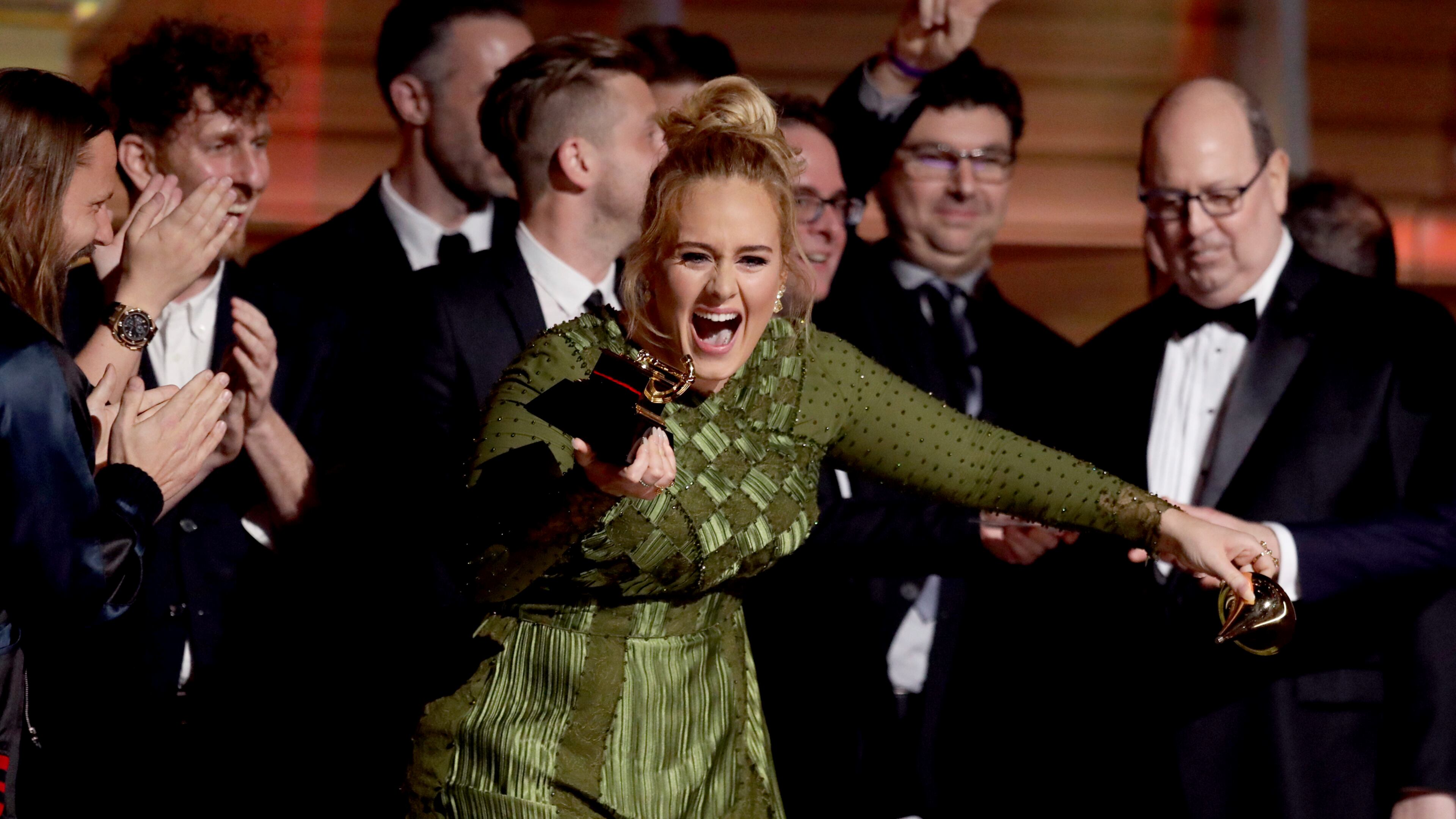 Adele accepts the award for album of the year for "25" at the 59th annual Grammy Awards on Sunday, Feb. 12, 2017, in Los Angeles. (Photo by Matt Sayles/Invision/AP)