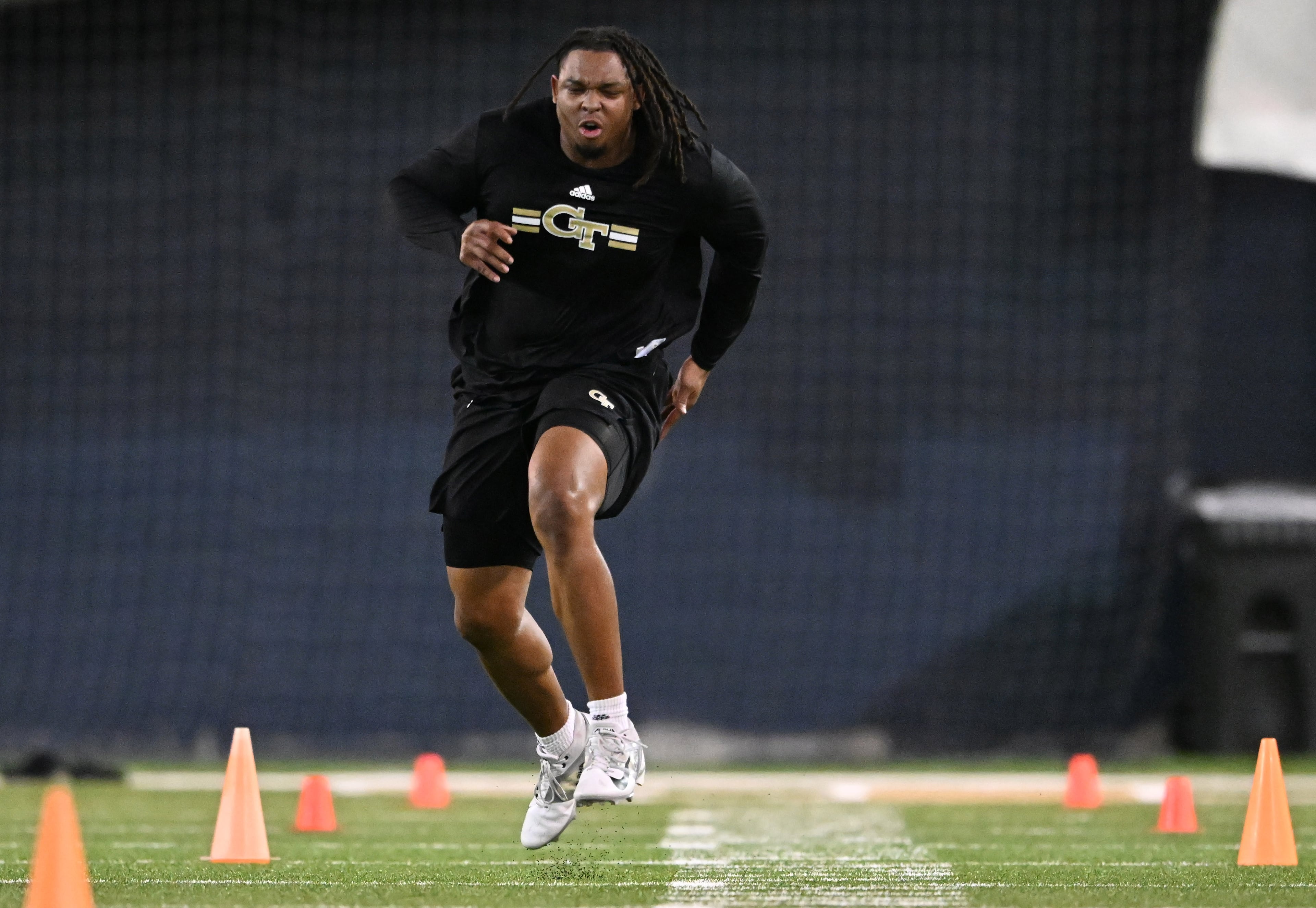 Georgia Tech offensive lineman Jordan Williams (54) reacts as he gets injured during his runs the 40-yard dash at Georgia Tech Pro Day at Rose Bowl Field and the Mary and John Brock Football Practice Facility, Friday, March 14, 2025, in Atlanta. (Hyosub Shin / AJC)