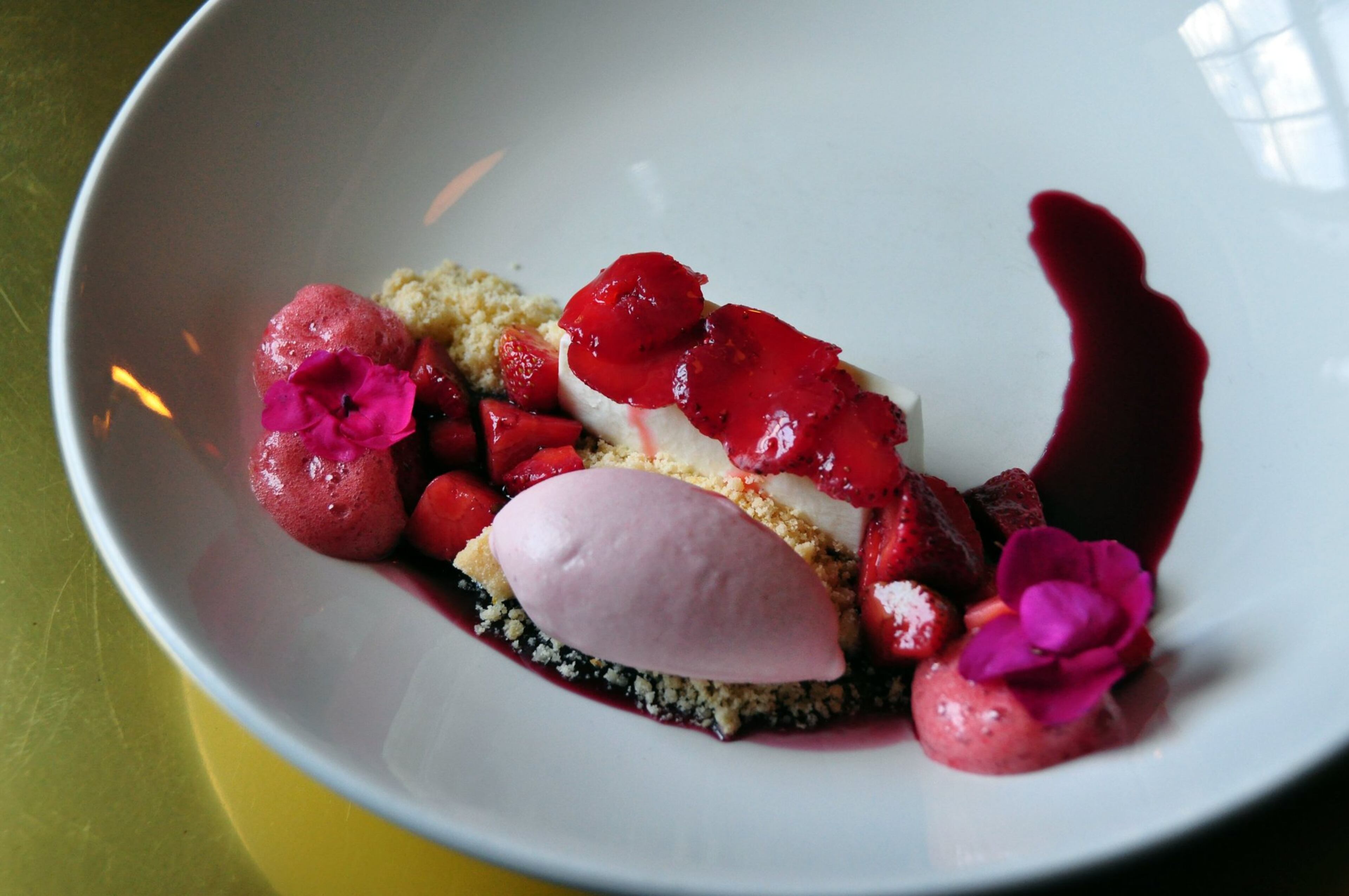 The Fraise With Benefits dessert from Tiny Lou’s pairs several strawberry elements with honey chèvre and crumbled citrus shortbread. CONTRIBUTED BY KRIS MARTINS