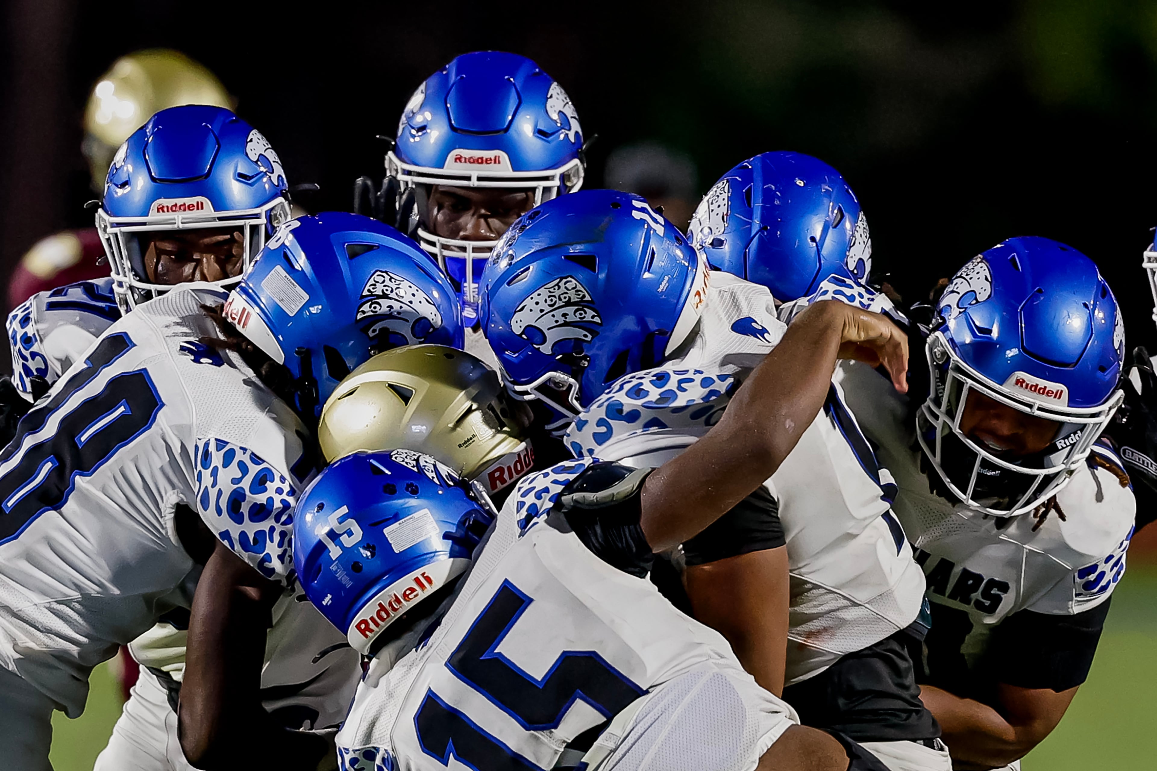 Tucker’s Jerron Guiden is swarmed by Stephenson defenders during their game at Hallford Stadium on Friday, Sept. 4, 2026, in Clarkston. (Erik S. Lesser for the AJC)