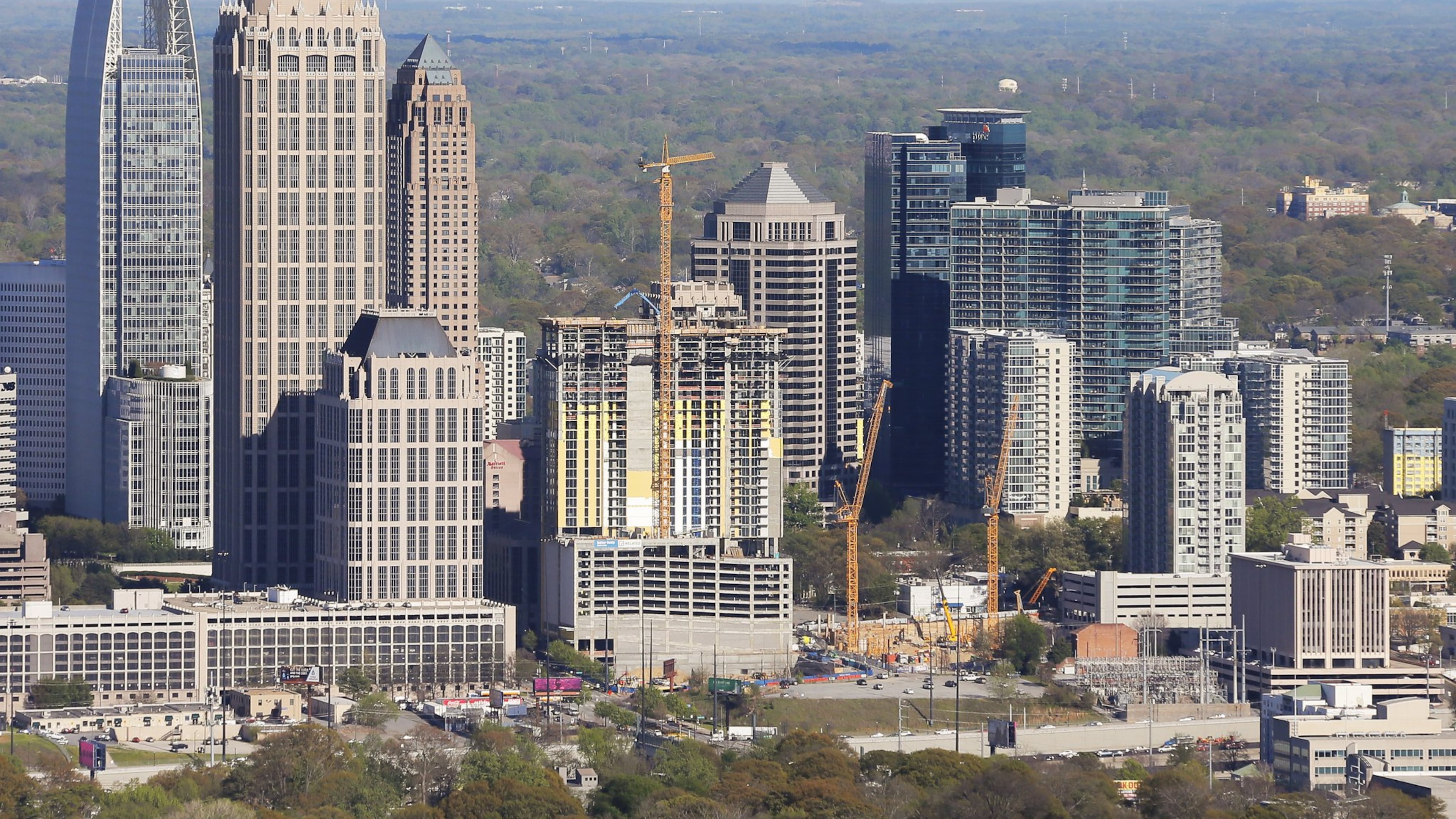 The skyline of Midtown. Two companies announced plans to expand in Atlanta on Thursday, including one that picked Atlanta for its North American headquarters. BOB ANDRES /BANDRES@AJC.COM