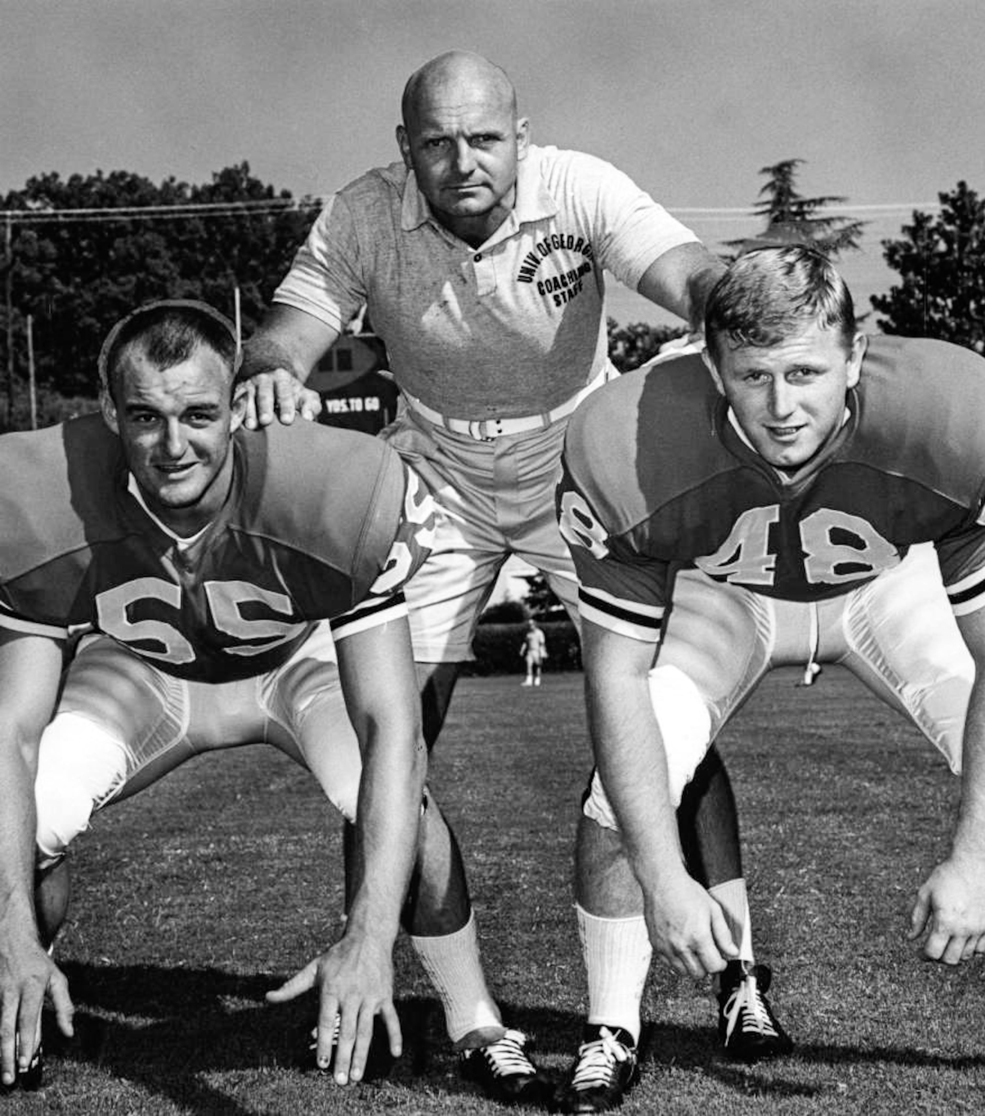 Georgia Bulldogs' defensive coordinator Erk Russell with linebackers Steve Neuhaus and John Glass, 1965