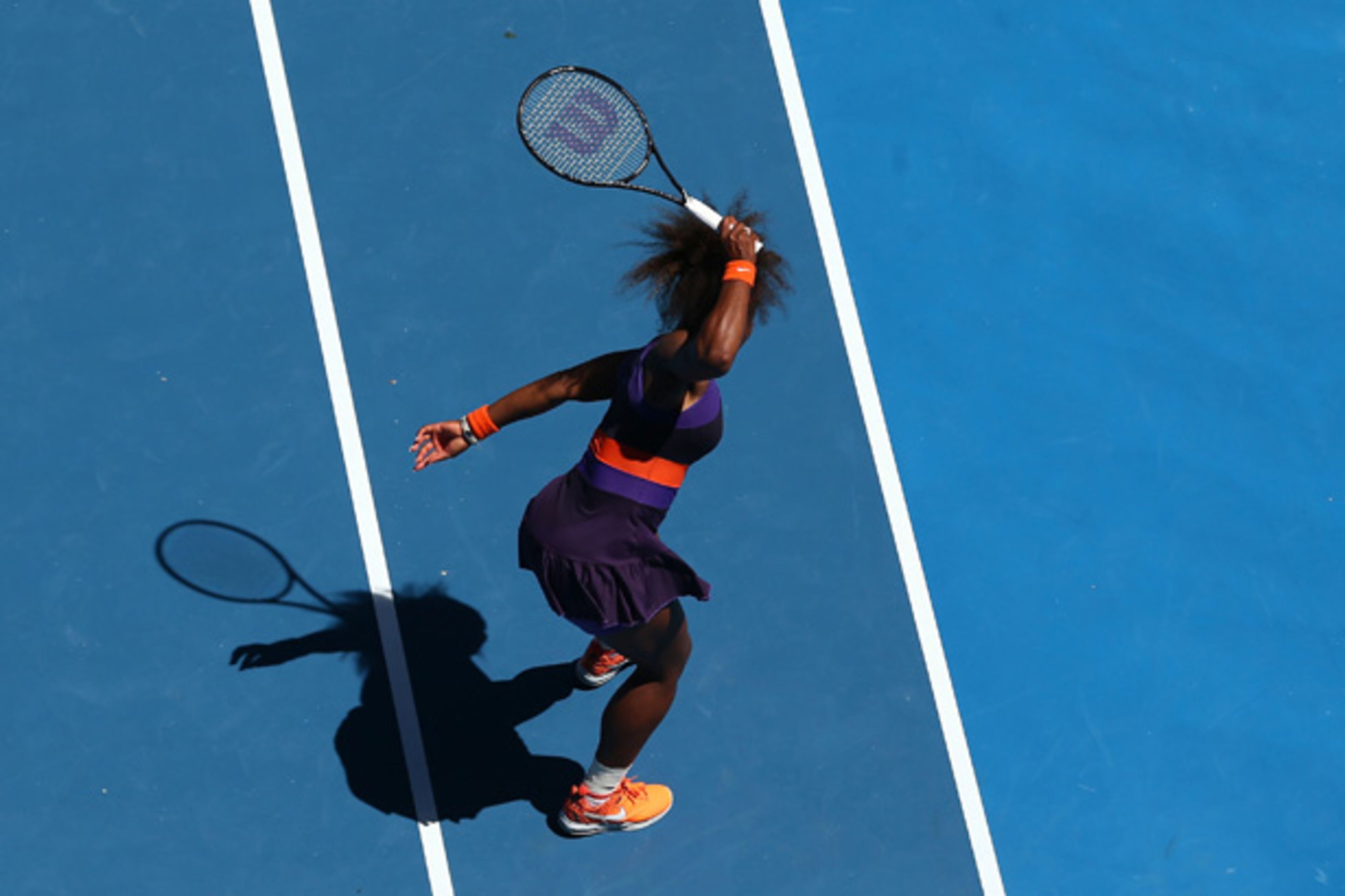 After losing a set, Serena raised her racket and ...