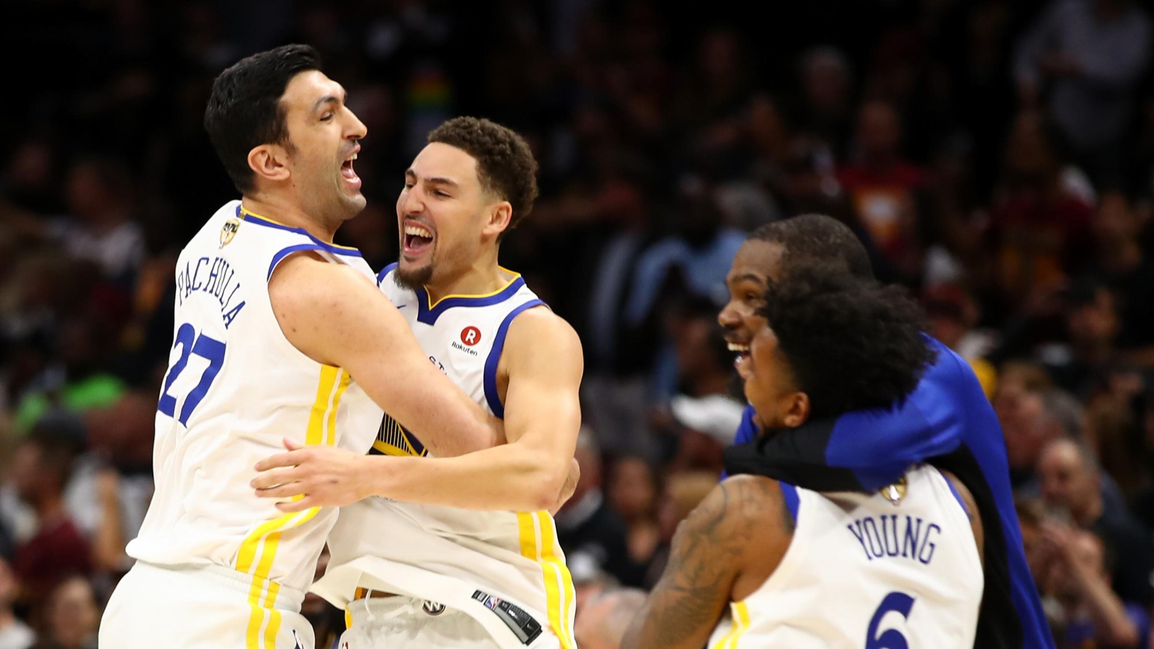 Former Hawks player Zaza Pachulia (left) and Golden State Warriors teammate Andre Iguodala celebrate after defeating the Cleveland Cavaliers during Game 4 of the NBA Finals. (Photo by Gregory Shamus/Getty Images)