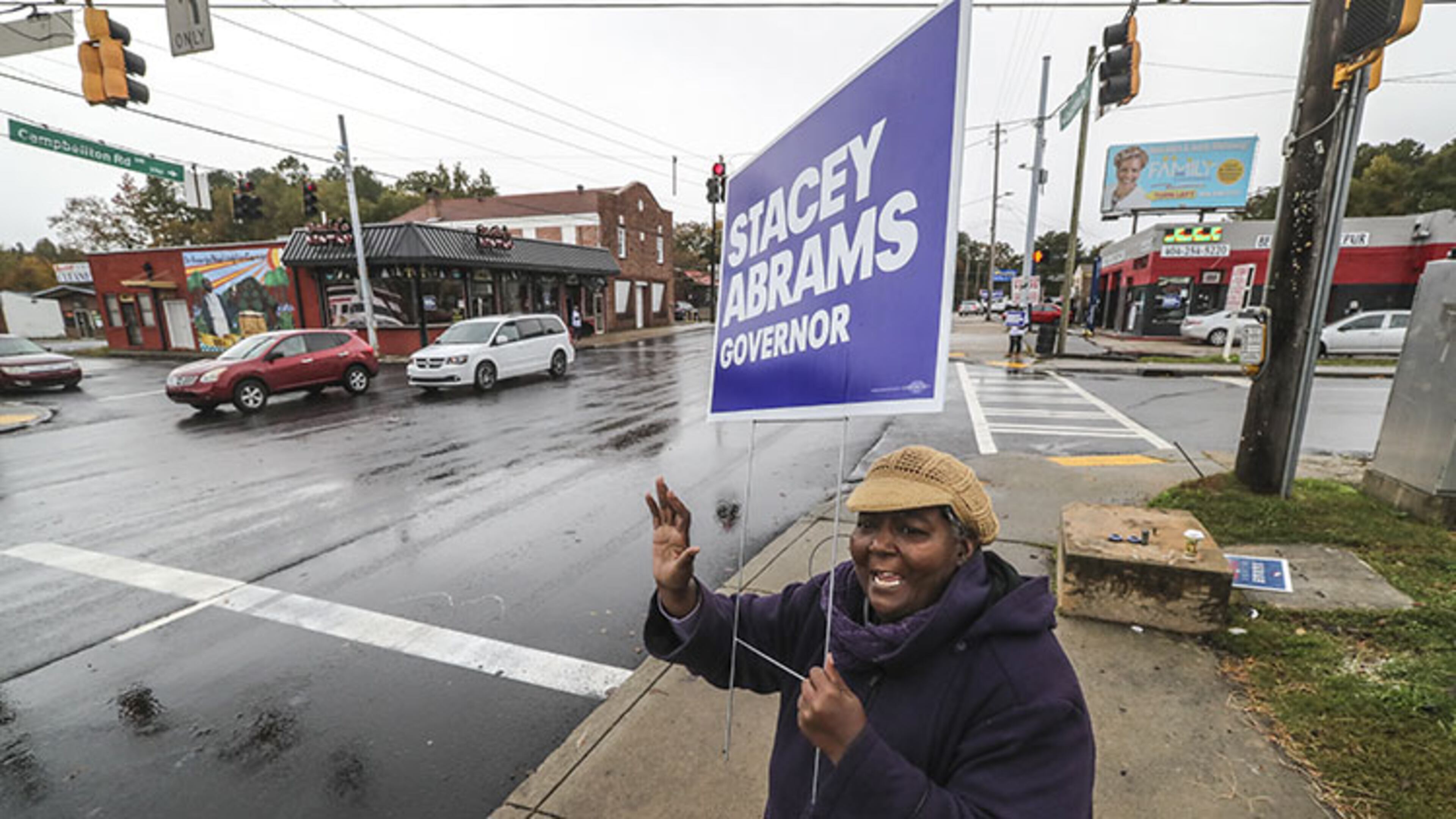 November 6, 2018 Atlanta : Virginia Smith worked on getting people to honk for Abrams at the corner of Campbeltown Road and Fairborn Road in Atlanta on Tuesday Nov. 6, 2018. Metro Atlanta polling places reported steady lines as voters went to the polls Tuesday. Georgia voters were asked Nov. 6 whether the state constitution should be amended to give a 10-year, $200 million boost to land conservation, solidify the state’s commitment to crime victims and cut timberland taxes. Five proposed amendments appeared on the ballot, which most notably settles the long and hard-fought races for governor and other key offices. JOHN SPINK/JSPINK@AJC.COM