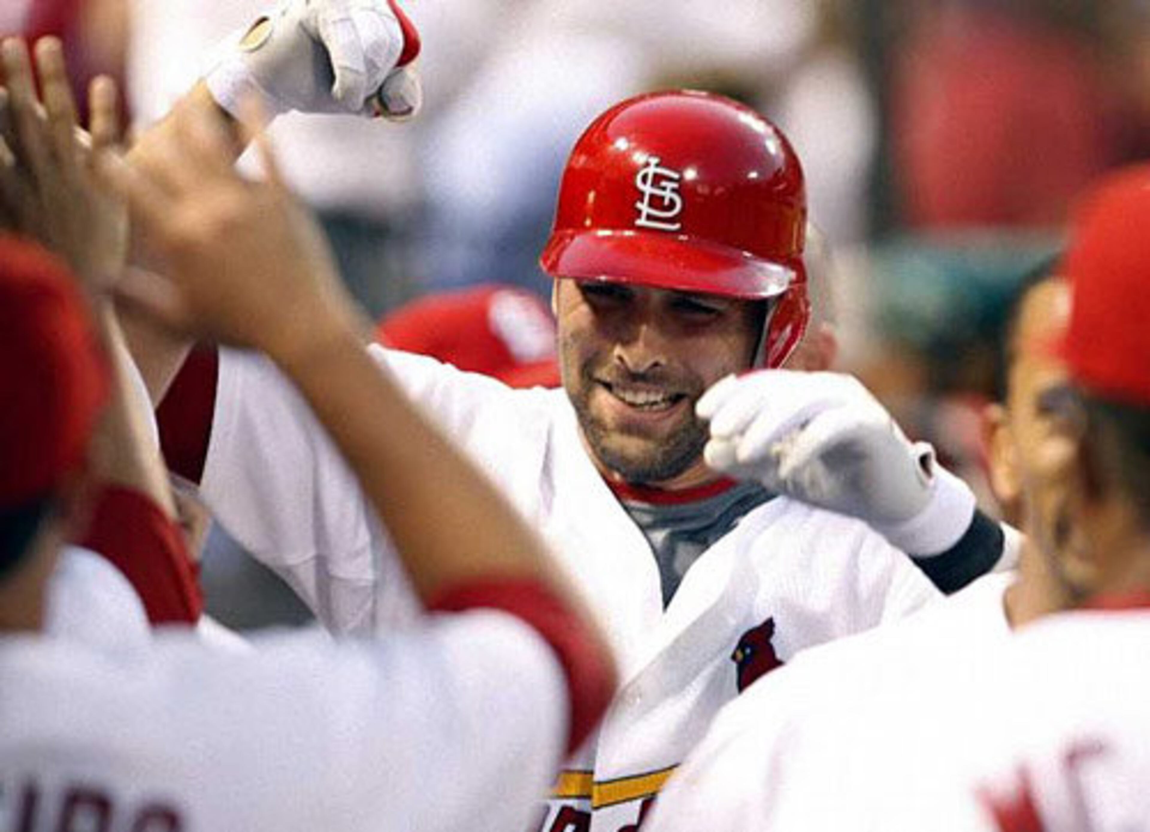 MARK DeROSA, 3B, Cardinals - DeRosa (center), a former Braves infielder, hit .250 with 23 HR and 78 RBI for Cleveland and St. Louis in 2009.