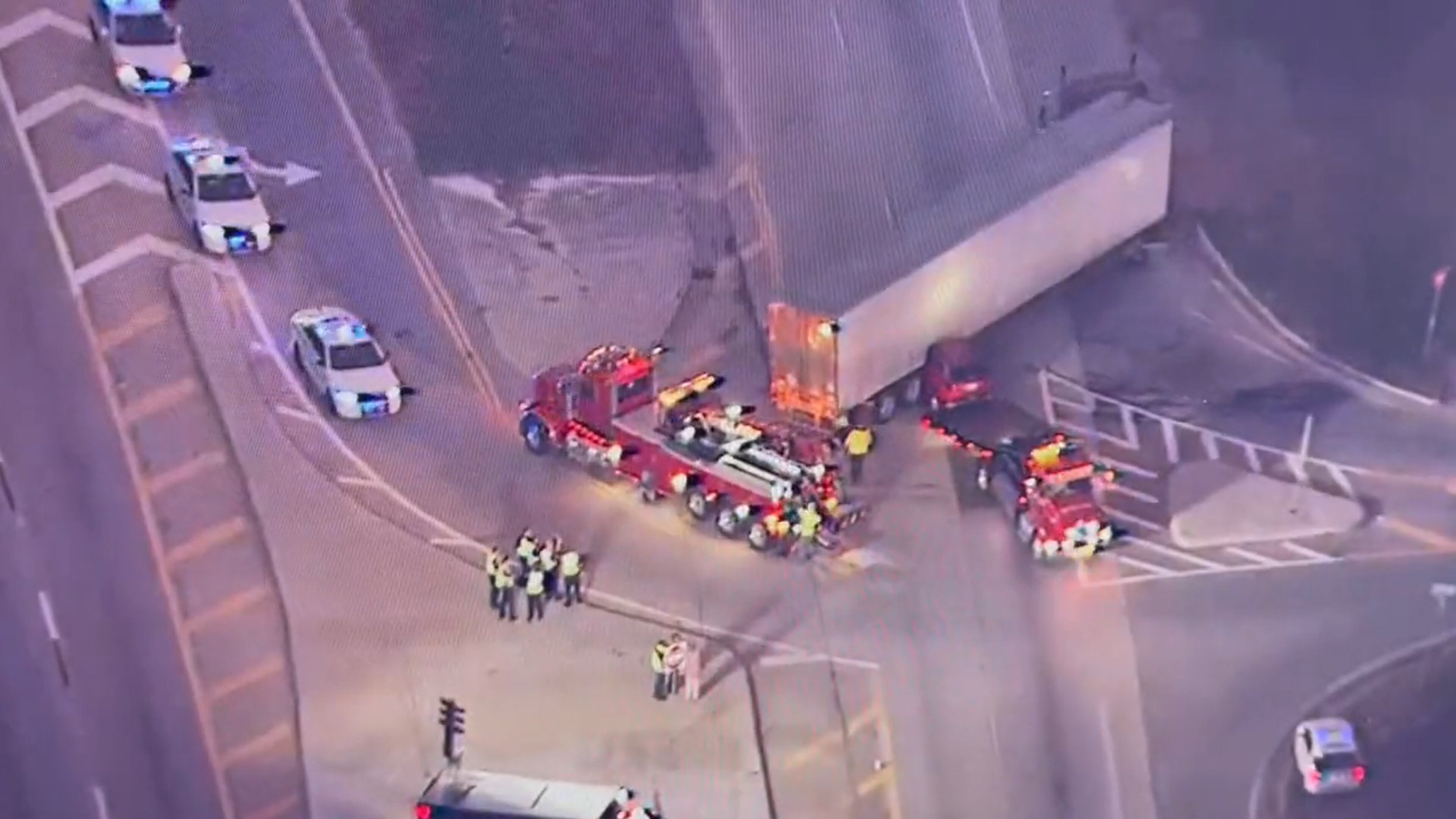 Gwinnett County police are investigating after a driver became trapped under a tractor-trailer on Ga. 316 near Dacula on Tuesday morning.