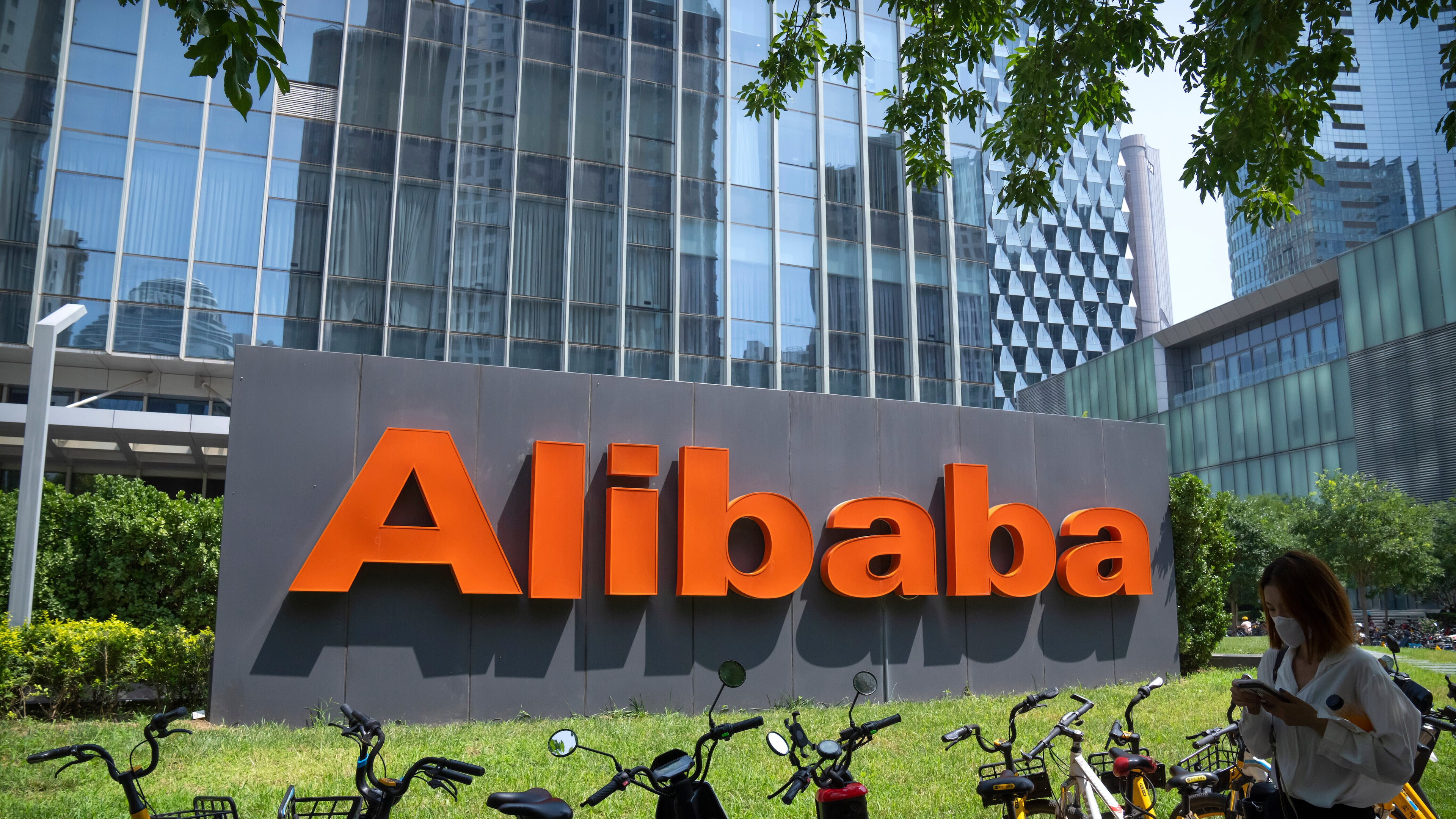 FILE - The logo of Chinese technology firm Alibaba is seen at its office in Beijing, Aug. 10, 2021. (AP Photo/Mark Schiefelbein, File)