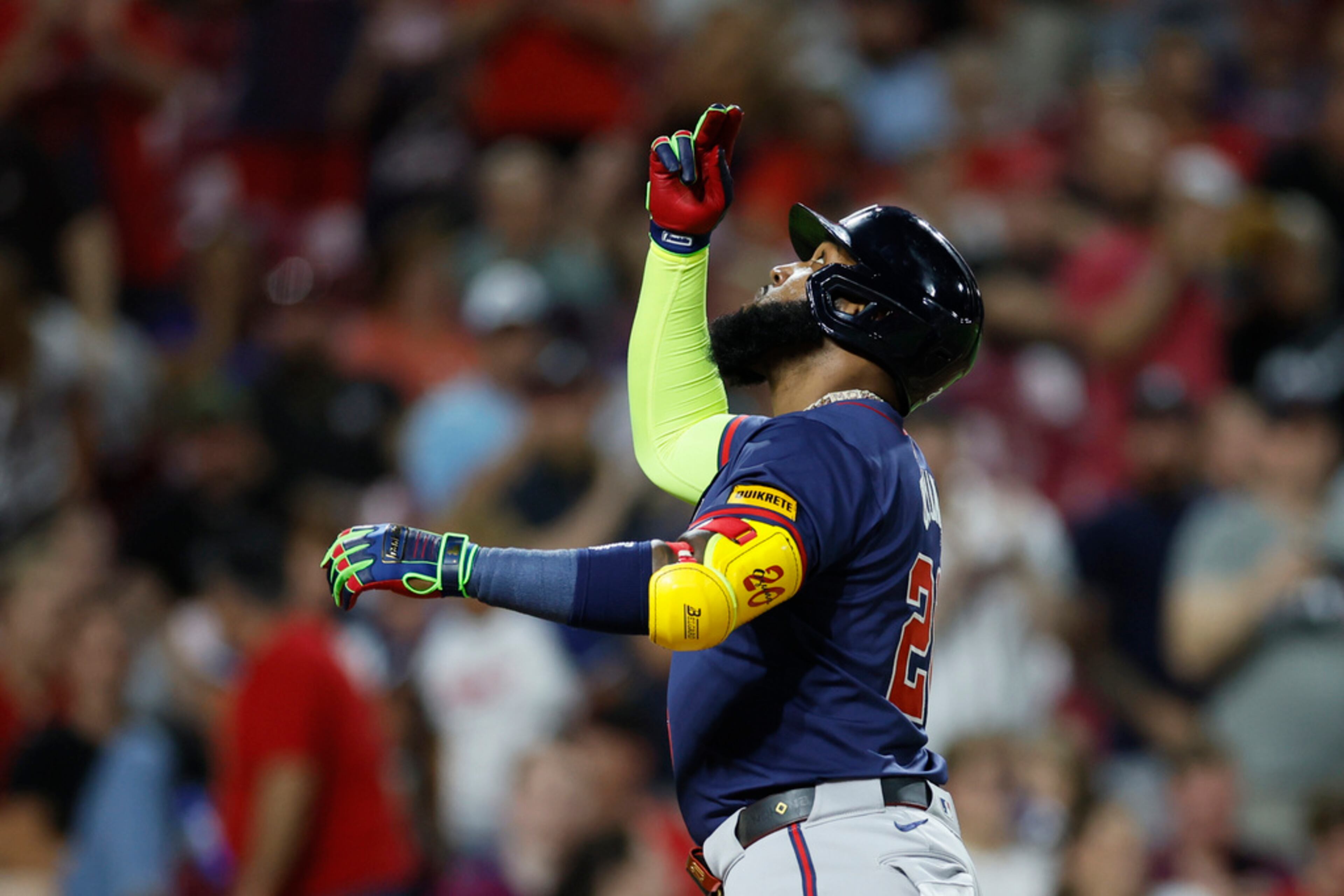 Atlanta Braves' Marcell Ozuna celebrates his home run against the Cincinnati Reds during the seventh inning of a baseball game Wednesday, Sept. 18, 2024, in Cincinnati. (AP Photo/Jay LaPrete)
