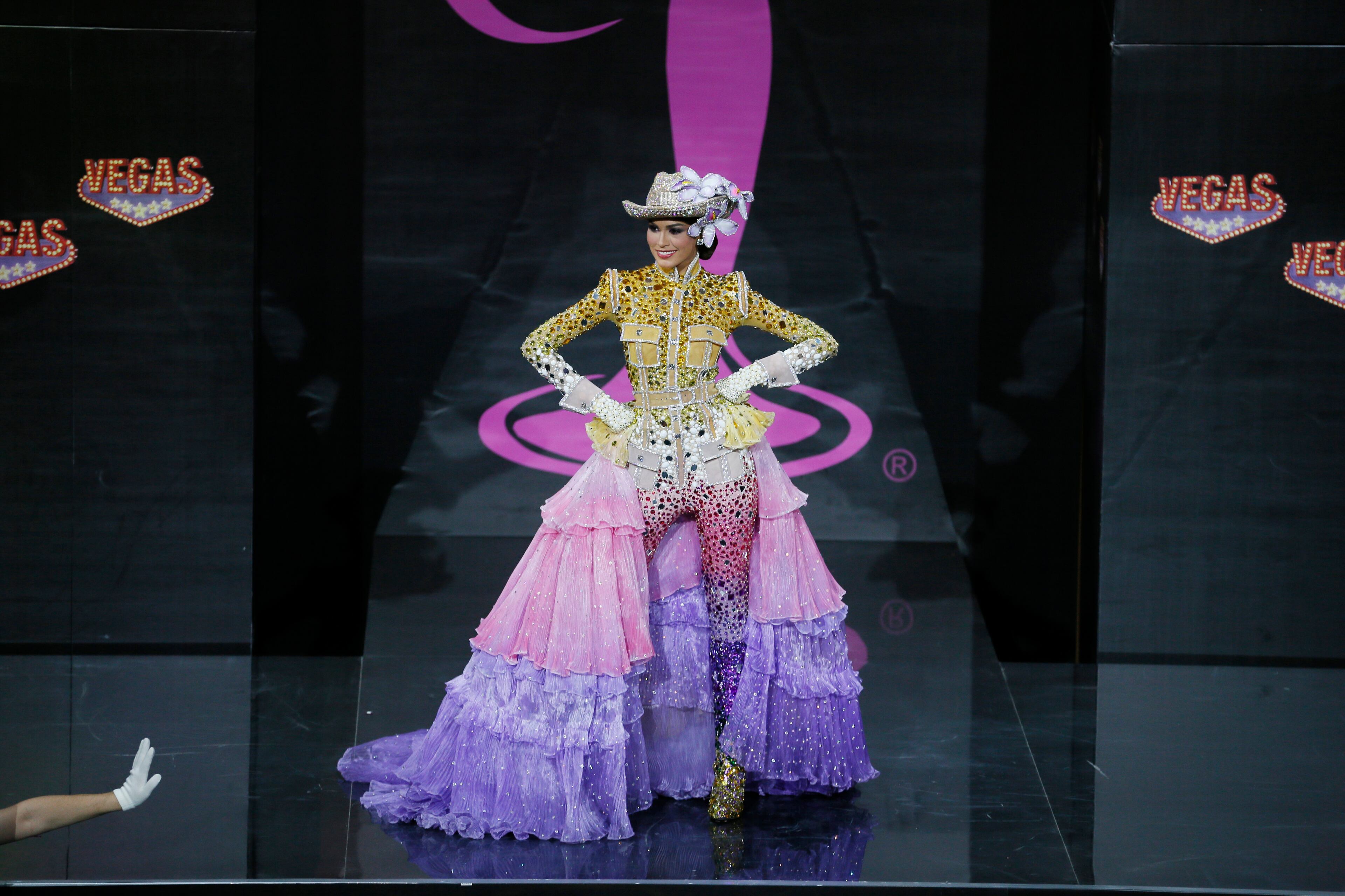 Miss Venezuela Gabriela Isler presents her outfit, during the national costume show at the 2013 Miss Universe pageant in Moscow, Russia, on Sunday, Nov. 3, 2013. Beauties will compete for the title of Miss Universe in Moscow on Nov. 9. (AP Photo/Pavel Golovkin)