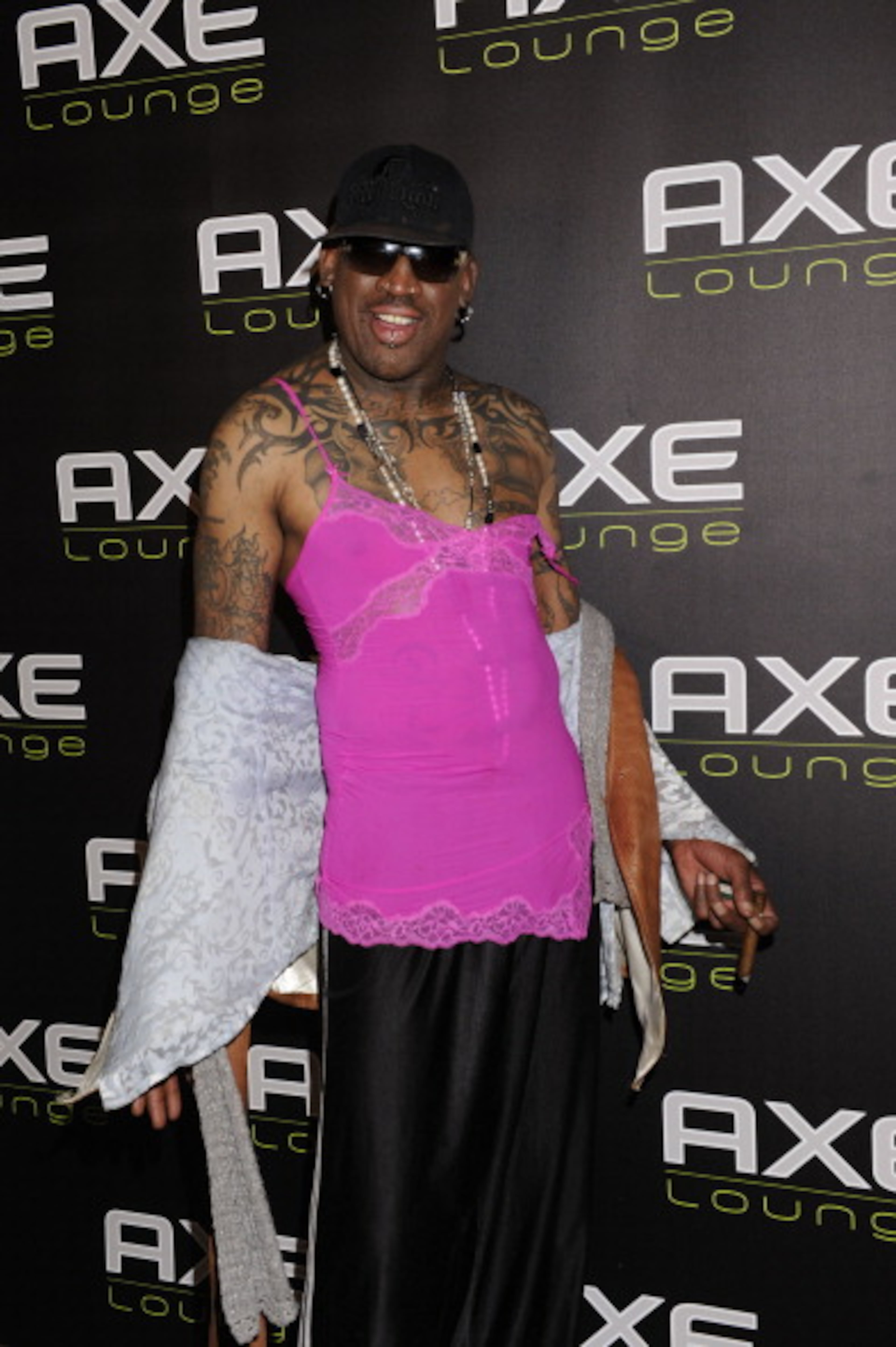 SOUTHAMPTON, NY - JUNE 04: Dennis Rodman celebrates his 50th Birthday At The AXE Lounge on June 4, 2011 in Southampton, United States. (Photo by Eugene Gologursky/Getty Images for Axe)