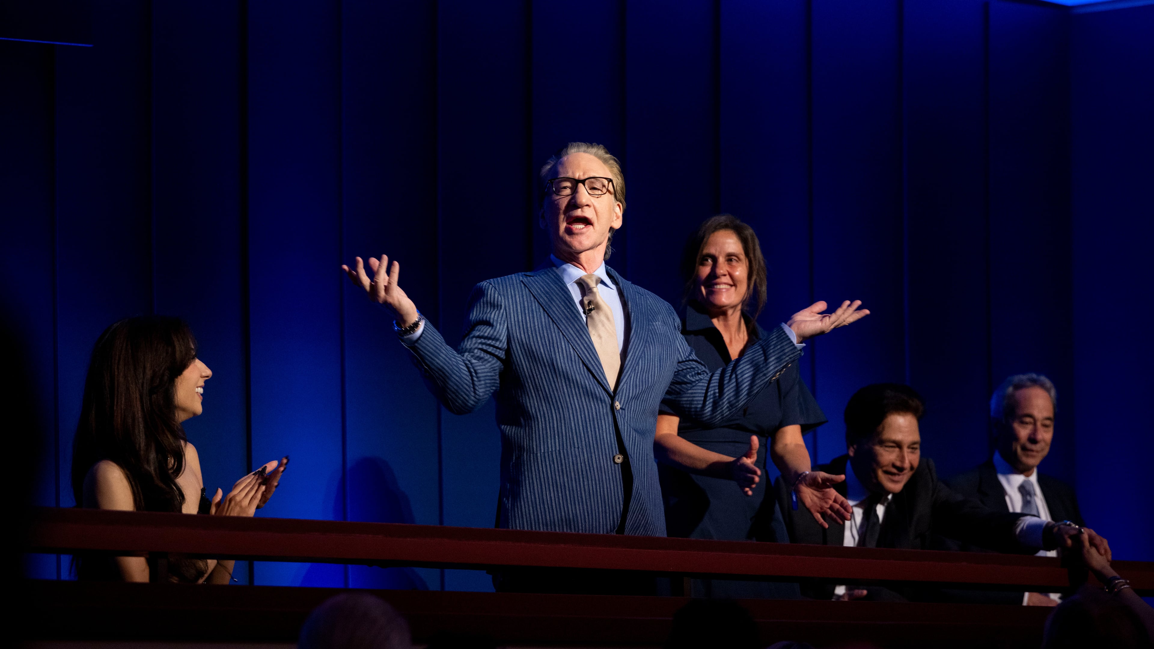 Comedian and political satirist Bill Maher motions to the audience at the start of the 27th Annual Mark Twain Prize for American Humor Celebrating Bill Maher, Sunday, June 29, 2026, in Washington. (AP Photo/Kevin Wolf)