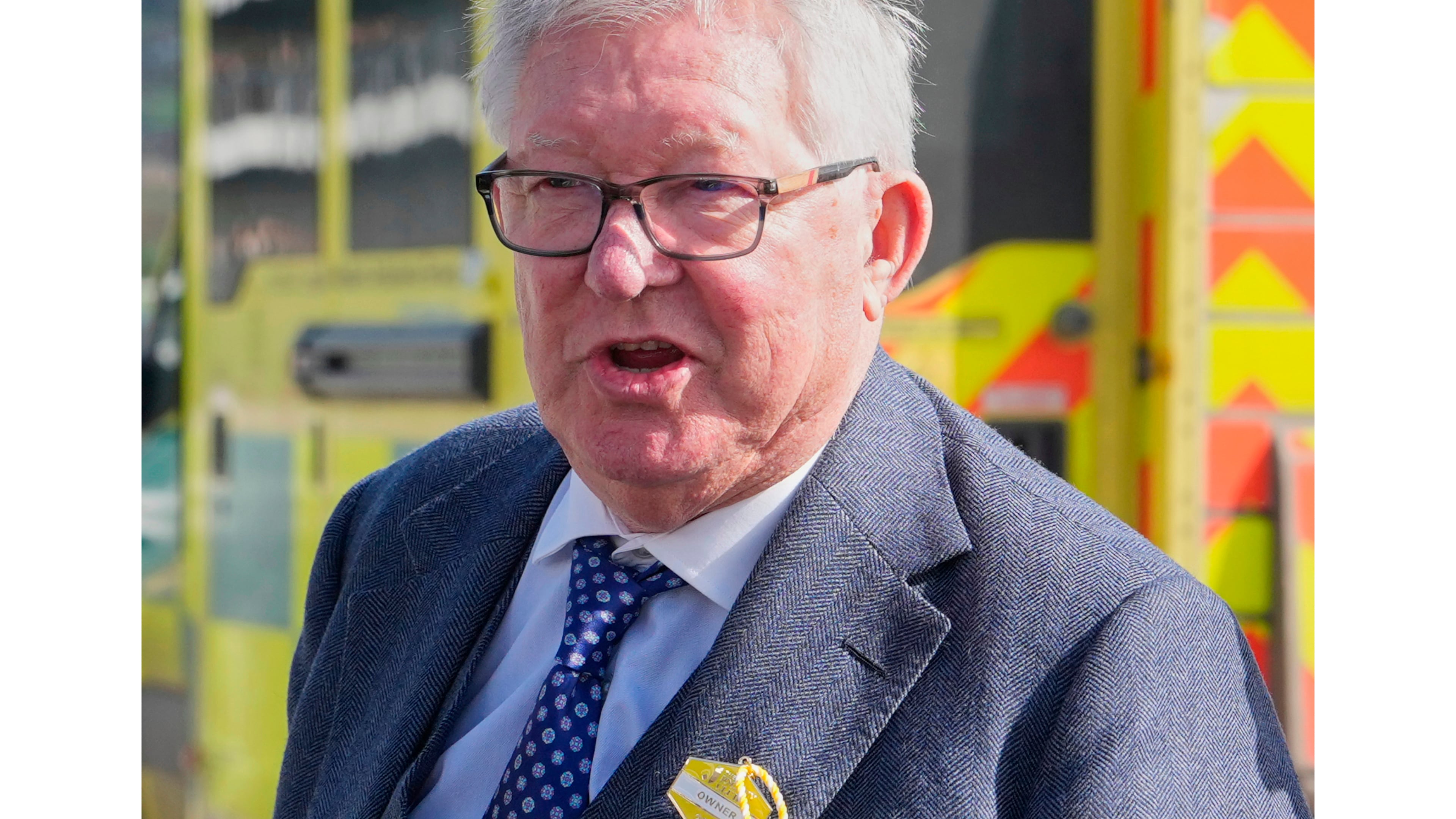 FILE - Former Manchester United soccer manager Alex Ferguson arrives on day four of the 2026 Cheltenham Festival in Cheltenham, England, March 13, 2026. (AP Photo/Dave Shopland, file)