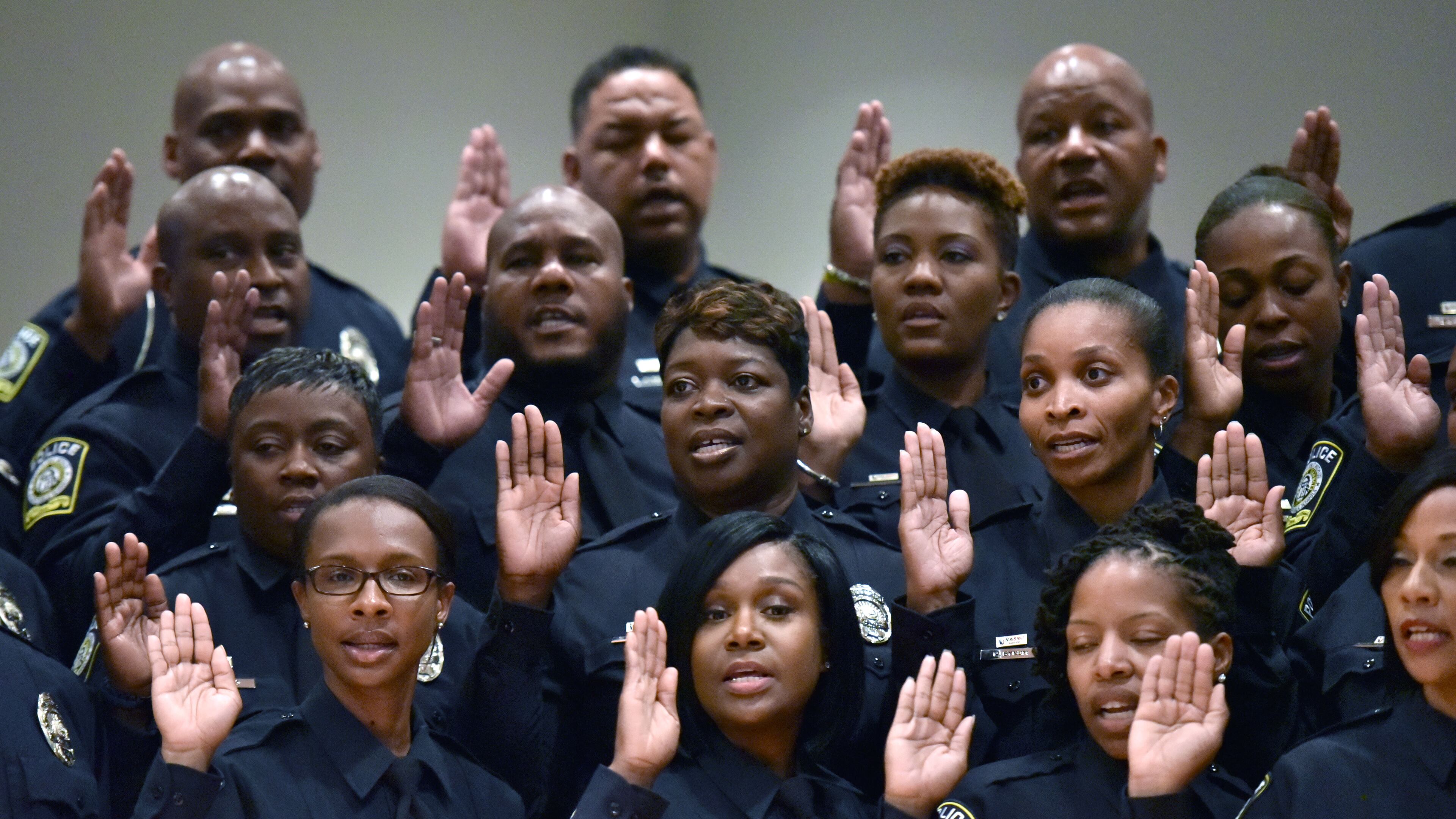 In 2016, Atlanta Public Schools created its own police force and had a swearing in ceremony. HYOSUB SHIN / HSHIN@AJC.COM
