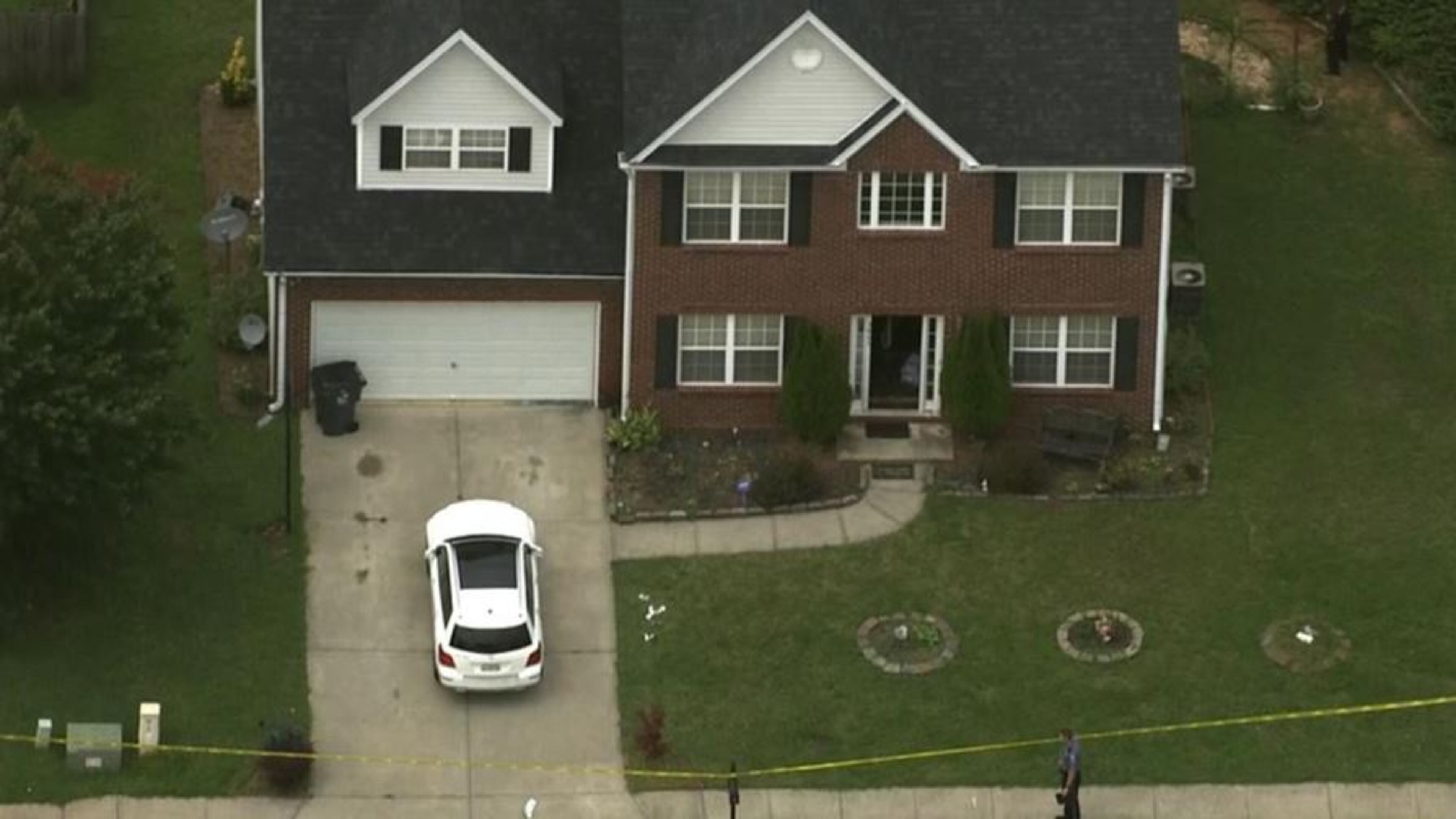 A stabbing was reported at this house on Crescent Walk Lane in Suwanee. (Credit: Channel 2 Action News)