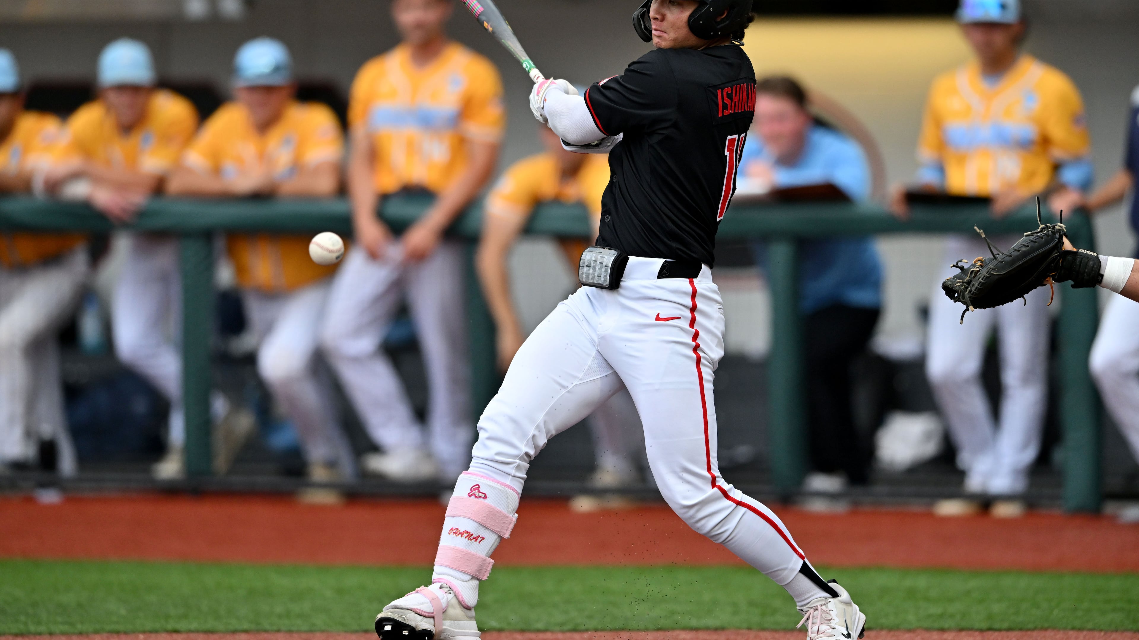Georgia Kenny Ishikawa (14) hits a single, but advances to third base on a throwing error during the third inning of their NCAA Regional game at Foley Field, Friday, May 29, 2026, in Athens. (Hyosub Shin/AJC)