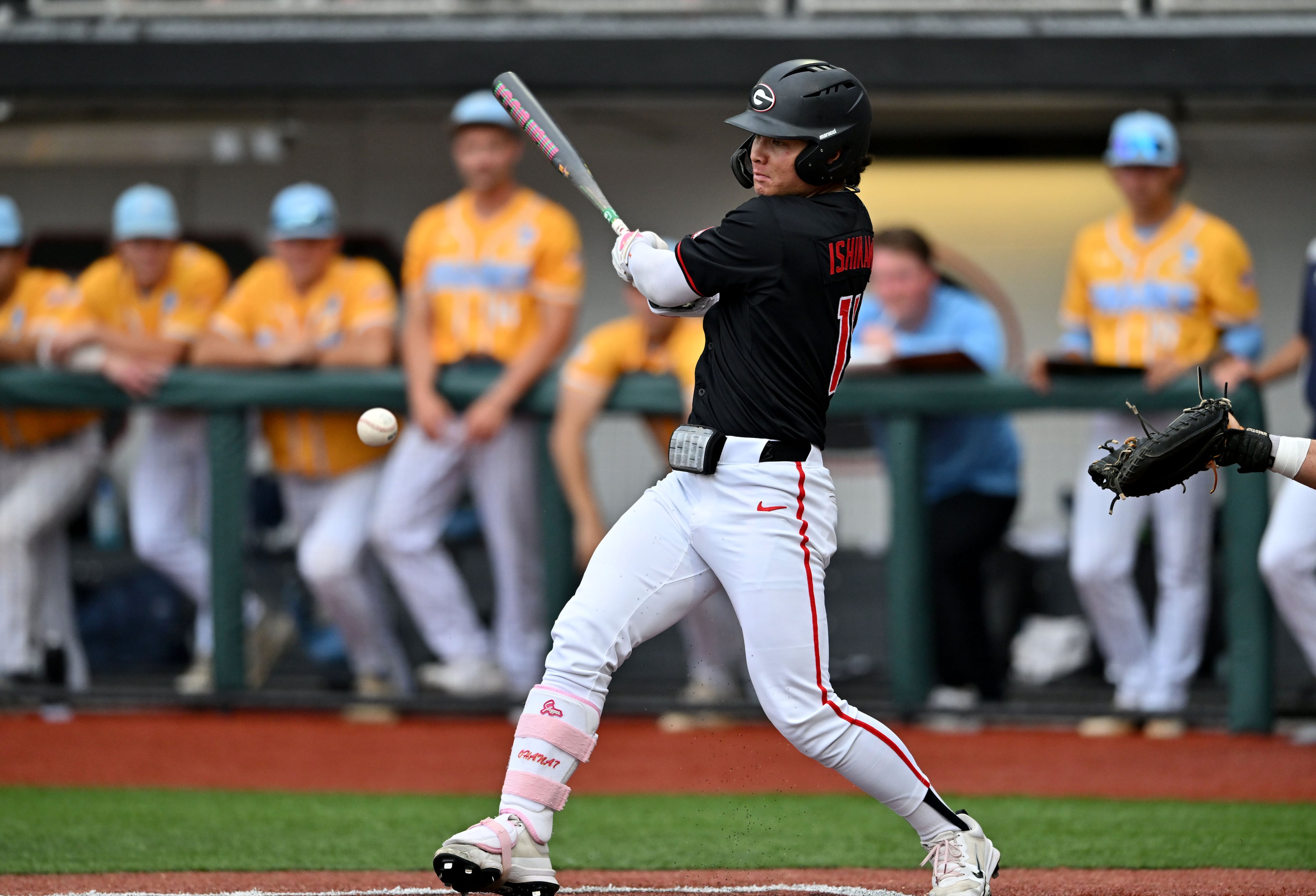 Georgia Kenny Ishikawa (14) hits a single, but advances to third base on a throwing error during the third inning of their NCAA Regional game at Foley Field, Friday, May 29, 2026, in Athens. (Hyosub Shin/AJC)
