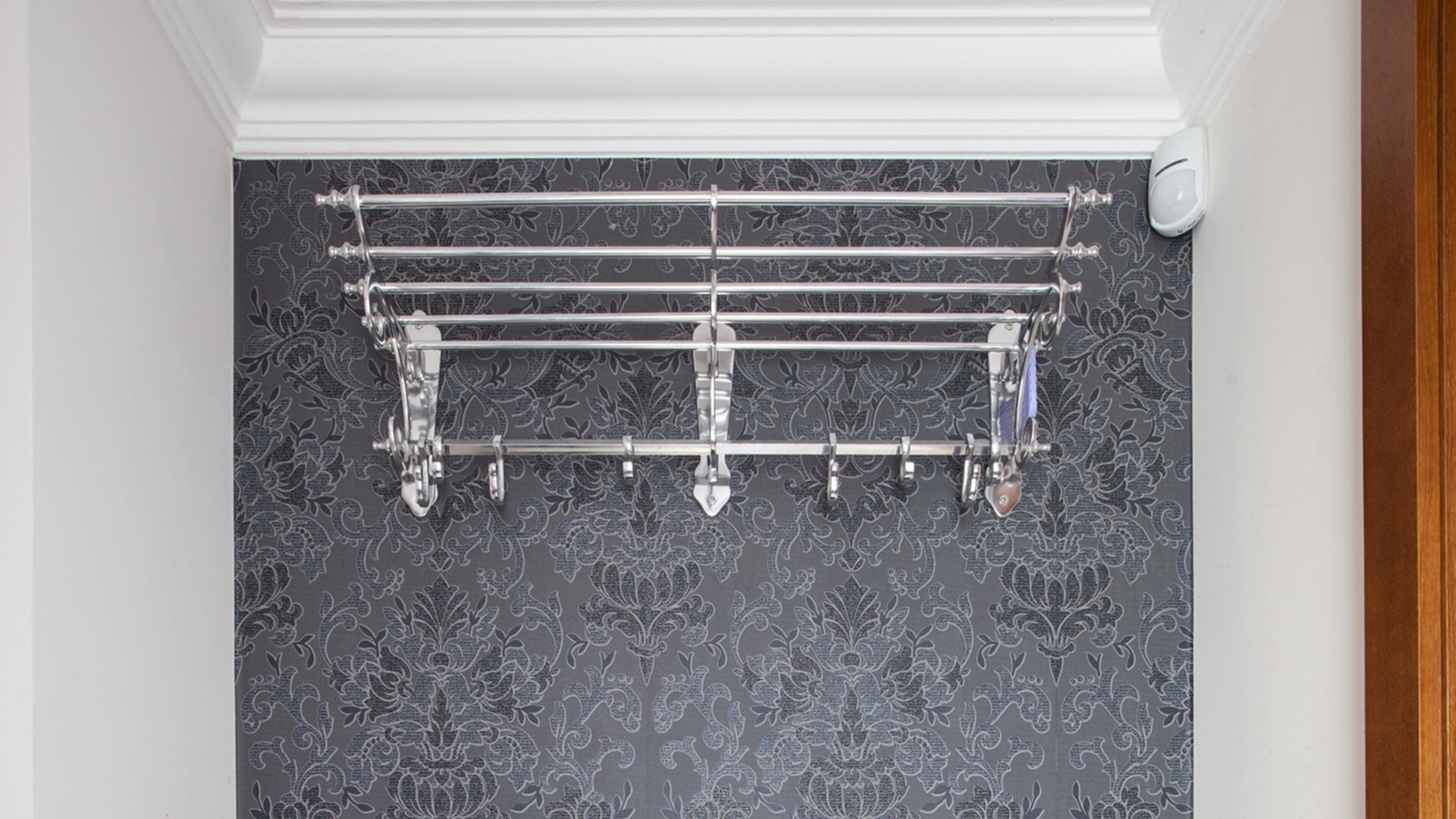 Wallpaper or mirror the back wall of your closet for some extra pizzazz. (Dreamstime)