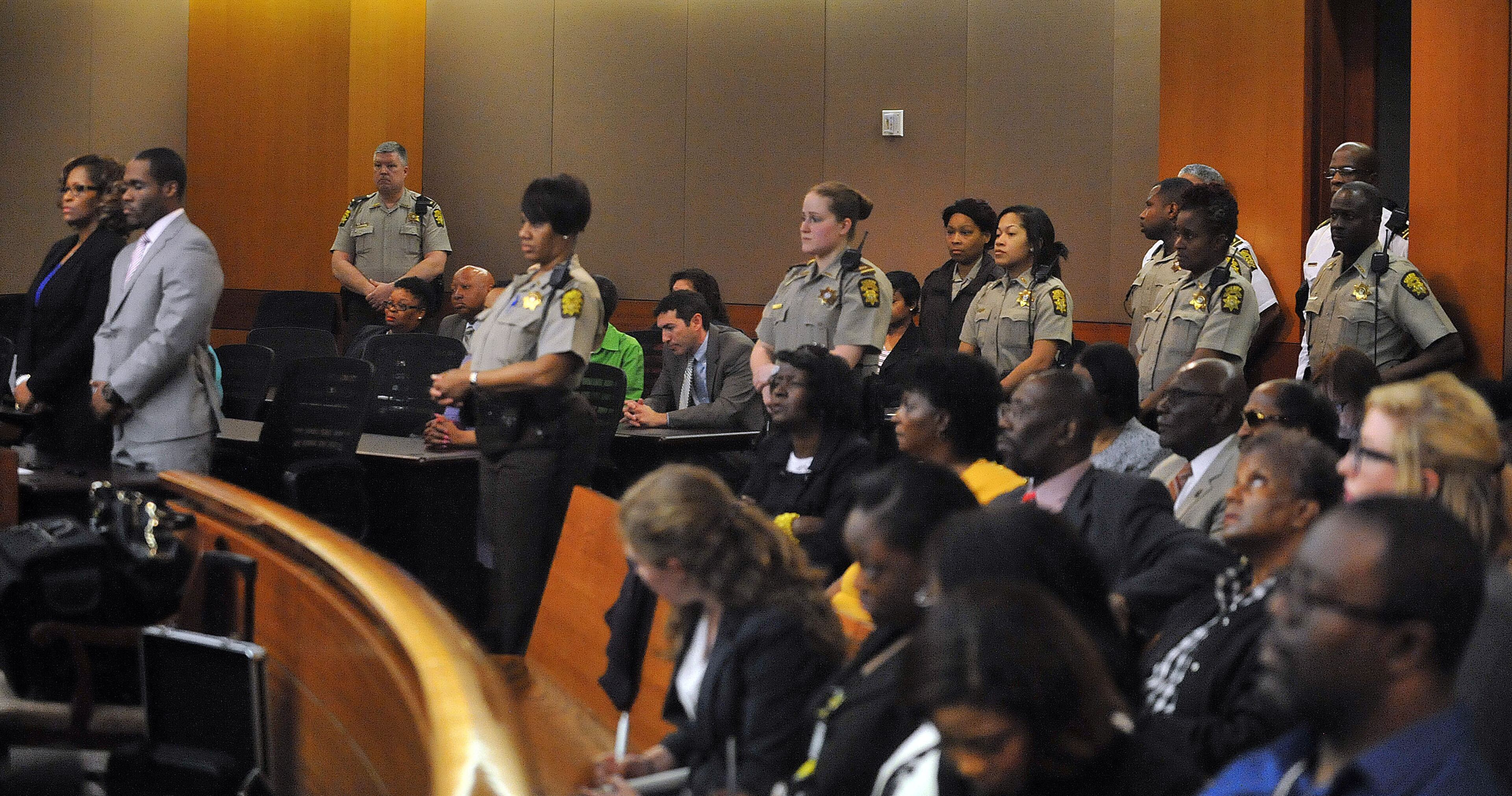 Extra deputies provide security in the courtroom as the verdicts are read. A jury of six men and six women render convicted 11 of 12 defendants on RICO and other assorted charges on their eighth day of deliberations in the Atlanta Public Schools test-cheating trial on Wednesday, April 1, 2015. Jurors sorted through roughly five months of testimony against 12 former educators accused of engaging in a racketeering conspiracy to inflate test scores. (Atlanta Journal-Constitution, Kent D. Johnson, Pool)