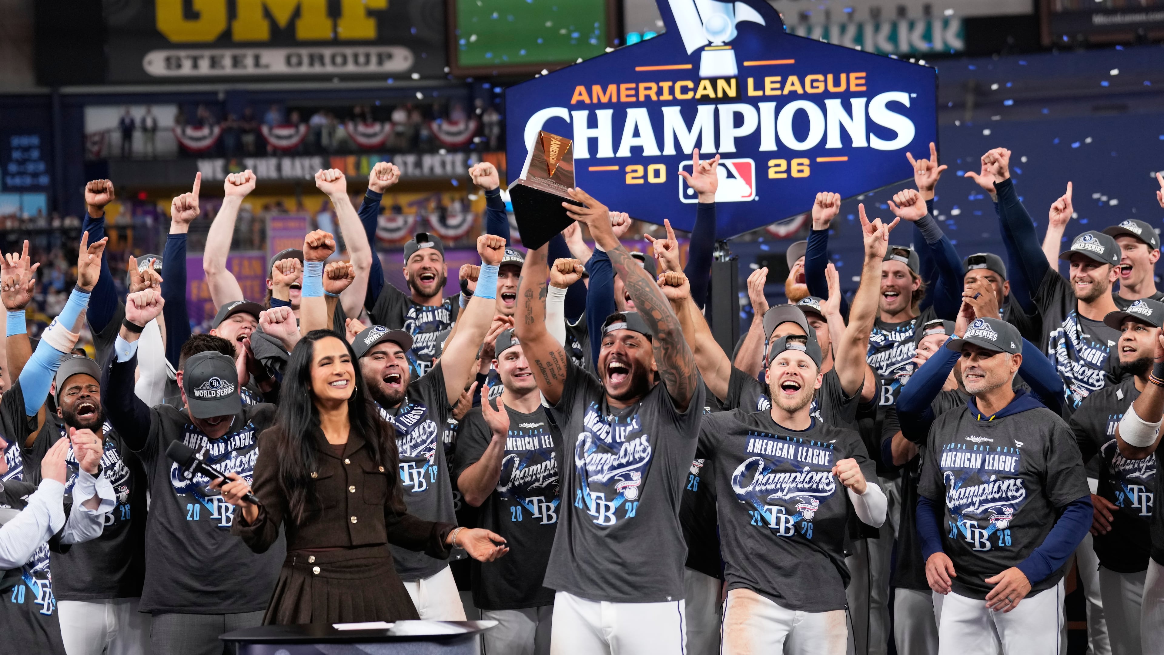 Tampa Bay Rays pitcher Freddy Peralta hold the MVP trophy after their win against the Cleveland Guardians in Game 6 of an American League Championship Series baseball game in St. Petersburg, Fla. Monday, Oct. 19, 2026. (AP Photo/David J. Phillip)