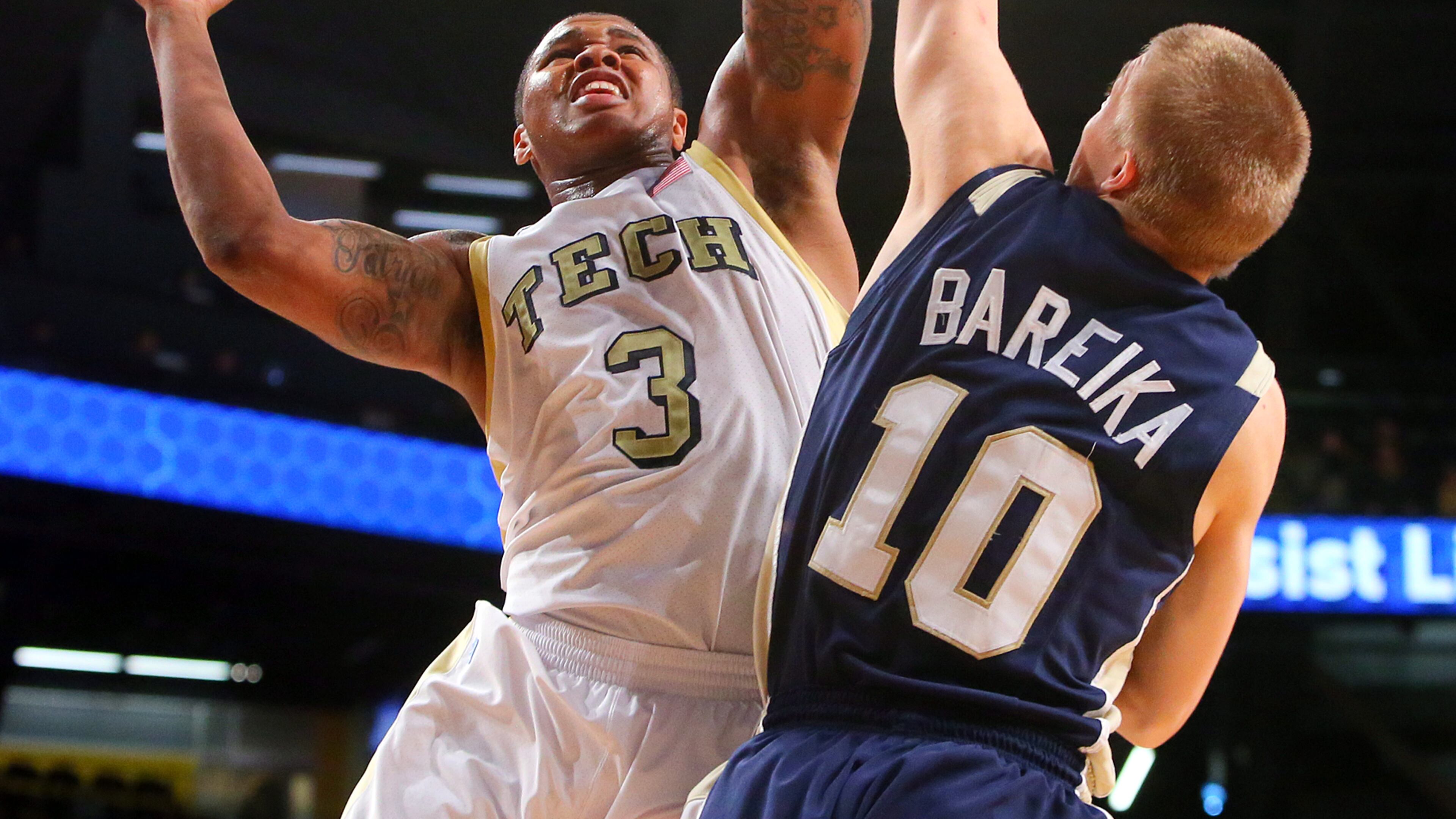 Georgia Tech guard Marcus Georges-Hunt shoots over Chattanooga Mocs defender Martynas Bareika during second half action at McCamish Pavilion in Atlanta on Wednesday, Jan. 2, 2013. CURTIS COMPTON / CCOMPTON@AJC.COM