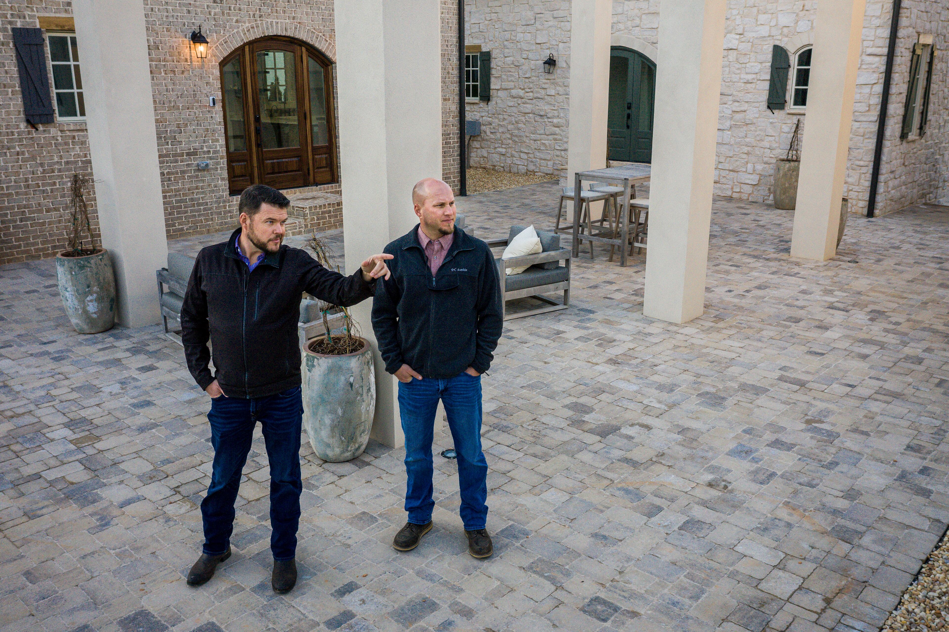 In the common area outside the new homes: Matt May (left) and Brett Baker (right), the men behind the build of the 5-home Trilith Micro Village II provincial collection of tiny homes. Text by Mike Rieman