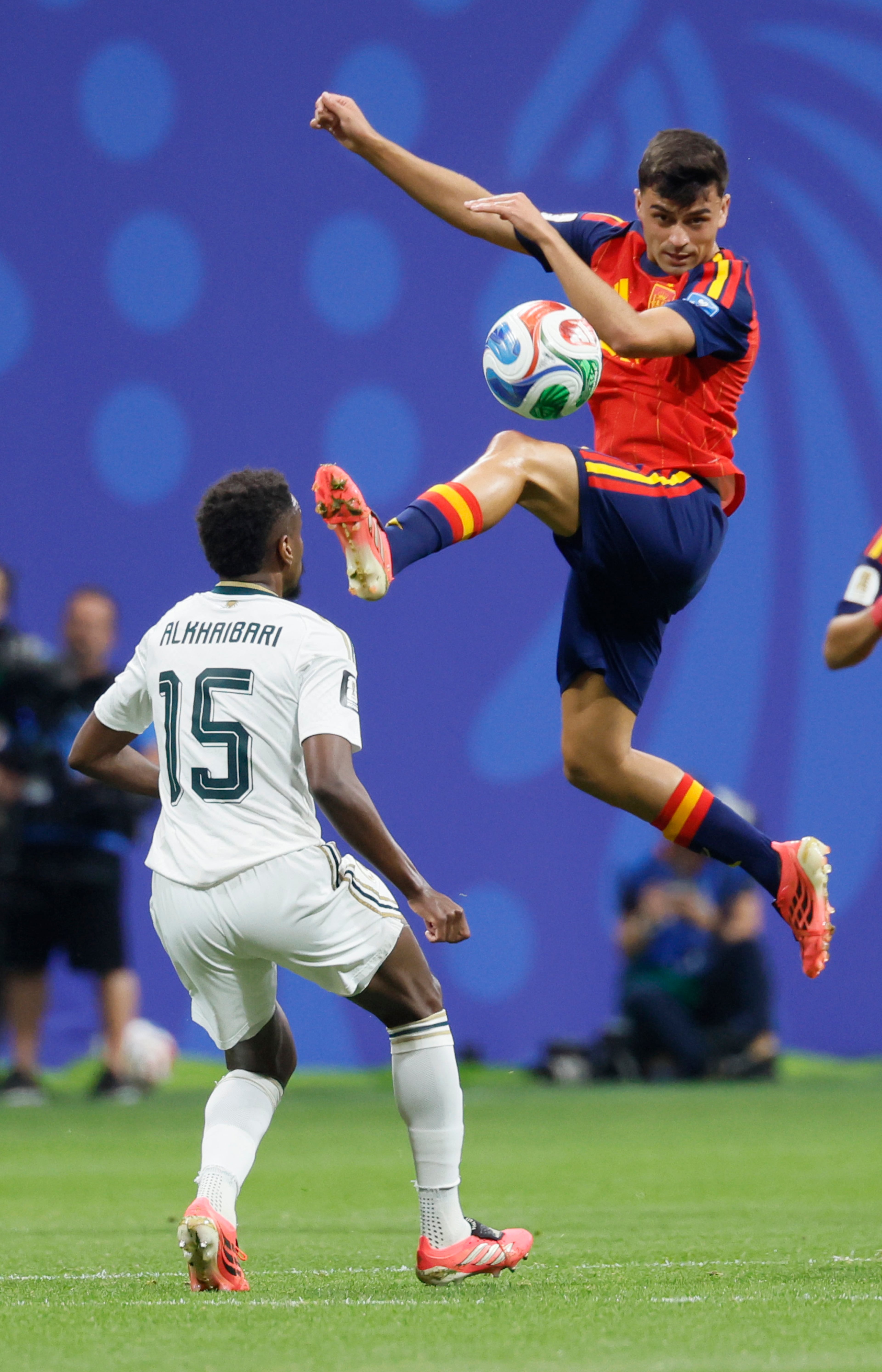 Spain's Pedri (right) controls the ball under pressure from Saudi Arabia's Abdullah Al-Khaibari during the first half of the Spain vs. Saudi Arabia World Cup match Sunday, June 21, 2026, at Atlanta Stadium. (Miguel Martinez/AJC)
