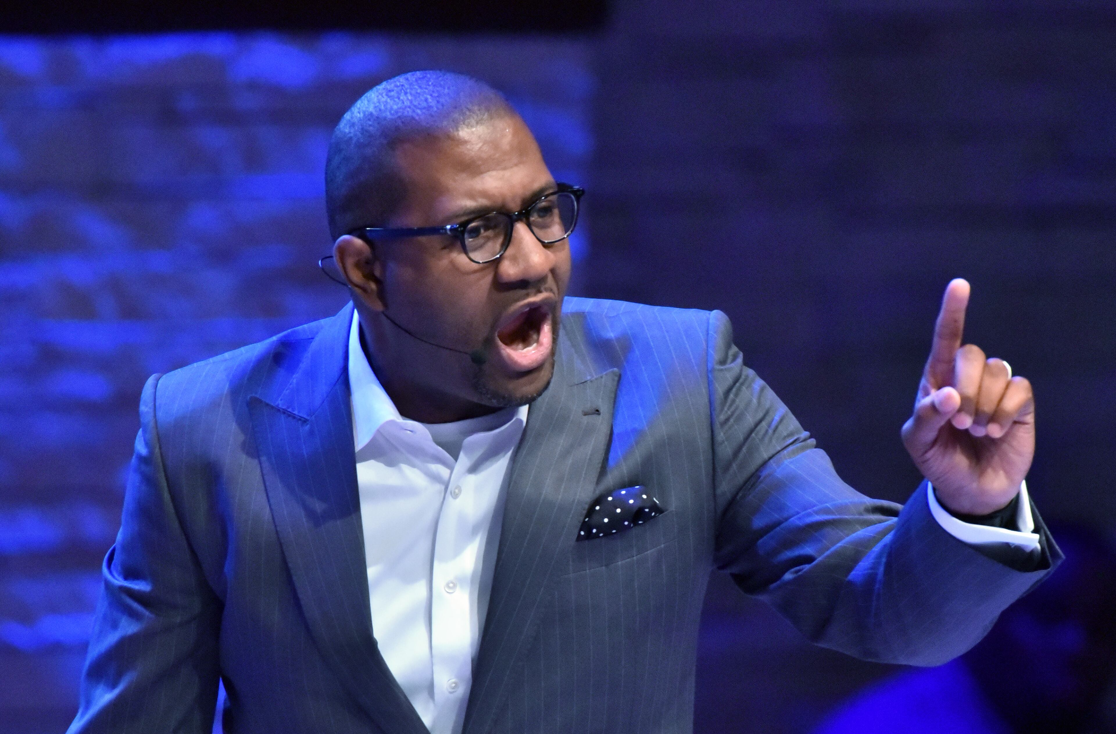 July 10, 2016 Dallas, Texas - Pastor Bryan Carter delivers a sermon at Concord Church in Dallas on Sunday, July 10, 2016. Two prominent pastors in Dallas are leading their flocks, and the entire city, through one of its grimmest chapters. Jeff Warren, who is white, and Bryan Carter, who is black, are renowned for their work espousing racial unity. They once swapped pulpits on Palm Sunday as a way of uniting their congregations and just got back from a joint pilgrimage to Charleston's Emanuel AME. They organized the huge downtown prayer service on Thursday and will no doubt speak on the topic from their respective pulpits on Sunday. HYOSUB SHIN / HSHIN@AJC.COM