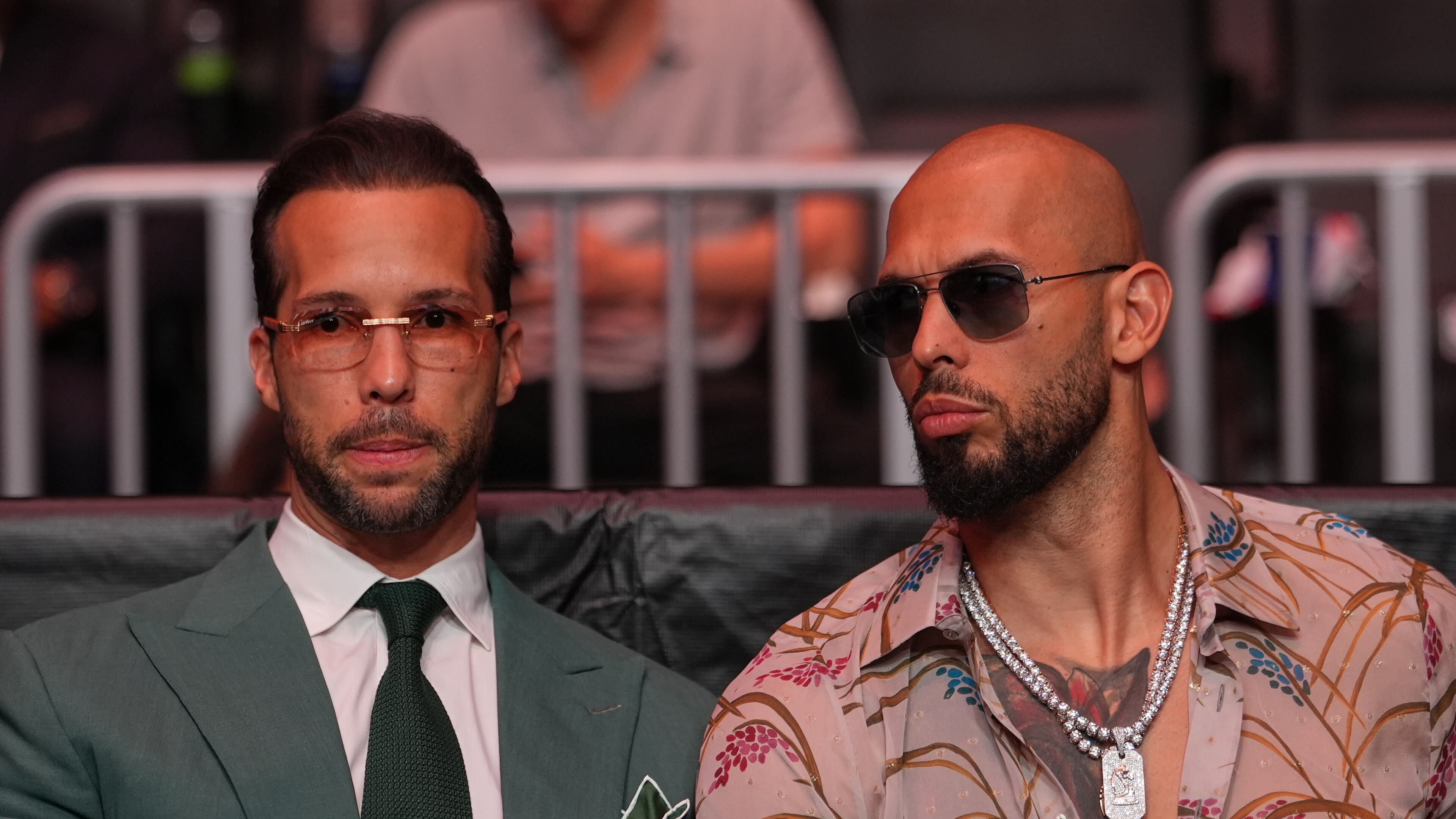 FILE - Andrew Tate, right, and his brother Tristan arrive at an event, April 11, 2026, in Miami. (AP Photo/Julia Demaree Nikhinson, Pool, File)