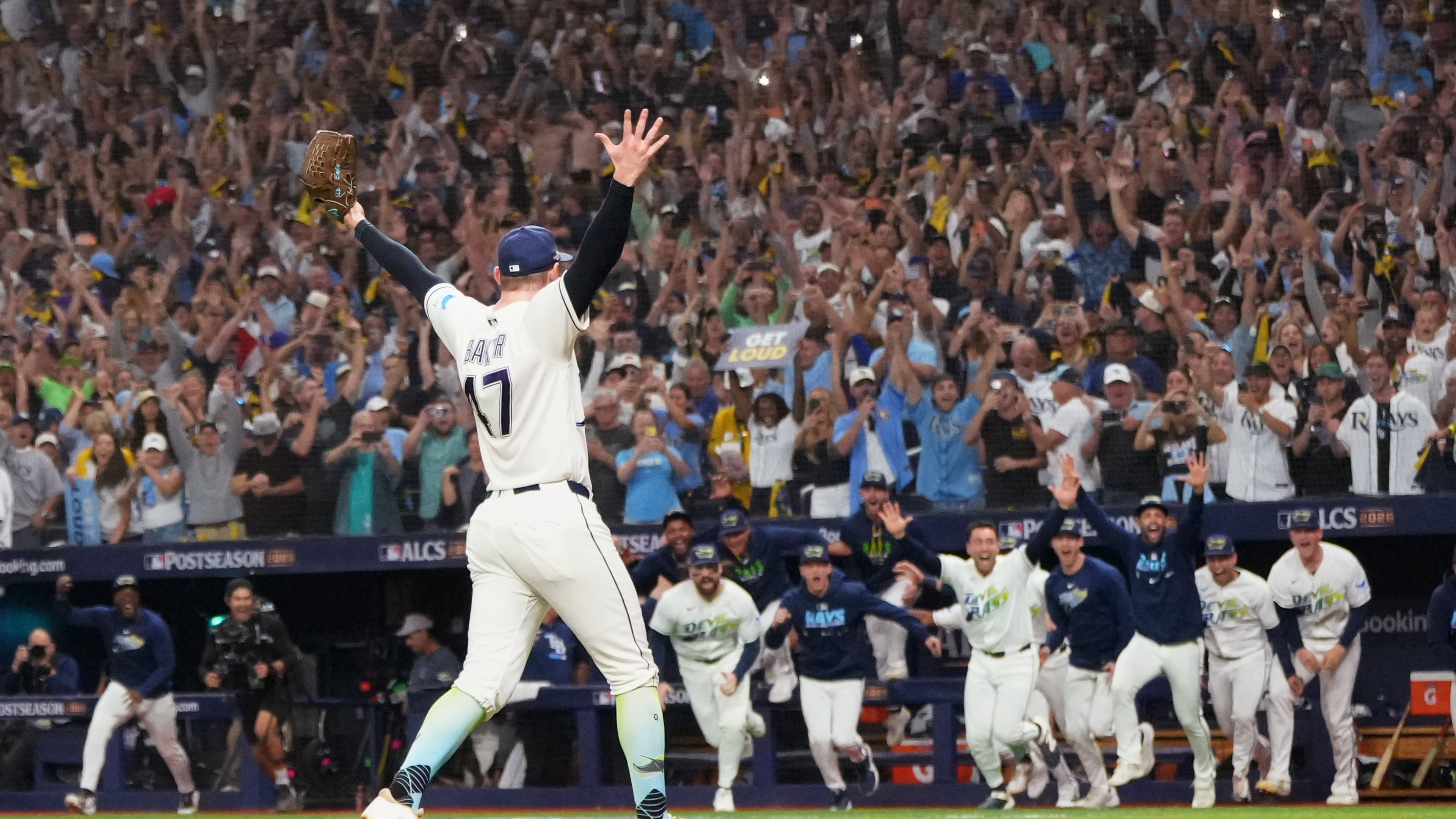 Tampa Bay Rays pitcher Bryan Baker celebrates their win against the Cleveland Guardians in Game 6 of an American League Championship Series baseball game in St. Petersburg, Fla. Monday, Oct. 19, 2026. (AP Photo/David J. Phillip)