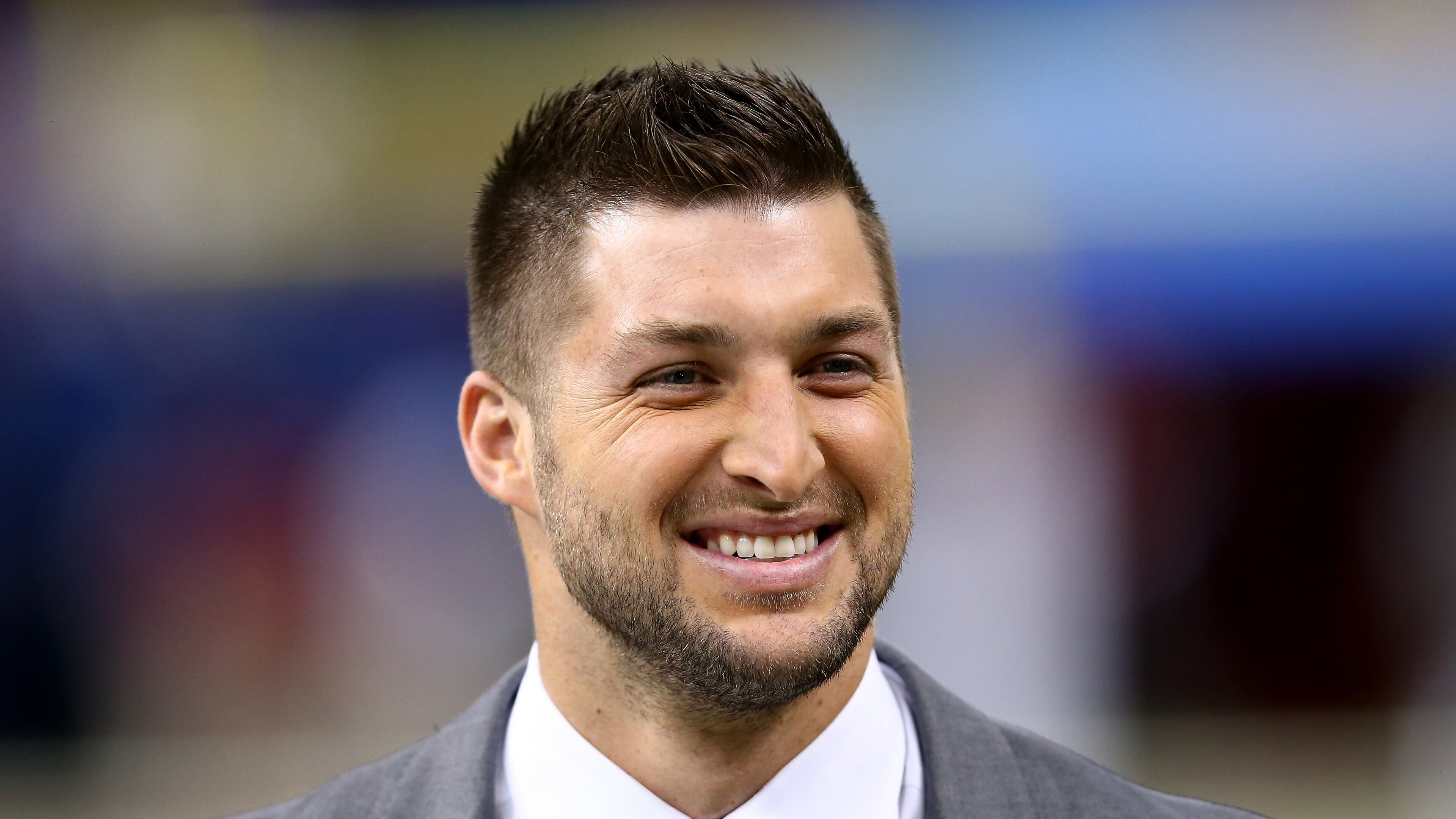NEW ORLEANS, LA - JANUARY 01: Former University of Florida quarterback Tim Tebow is seen on the sidelines prior to the start of the game during the All State Sugar Bowl at the Mercedes-Benz Superdome on January 1, 2015 in New Orleans, Louisiana. (Photo by Streeter Lecka/Getty Images)