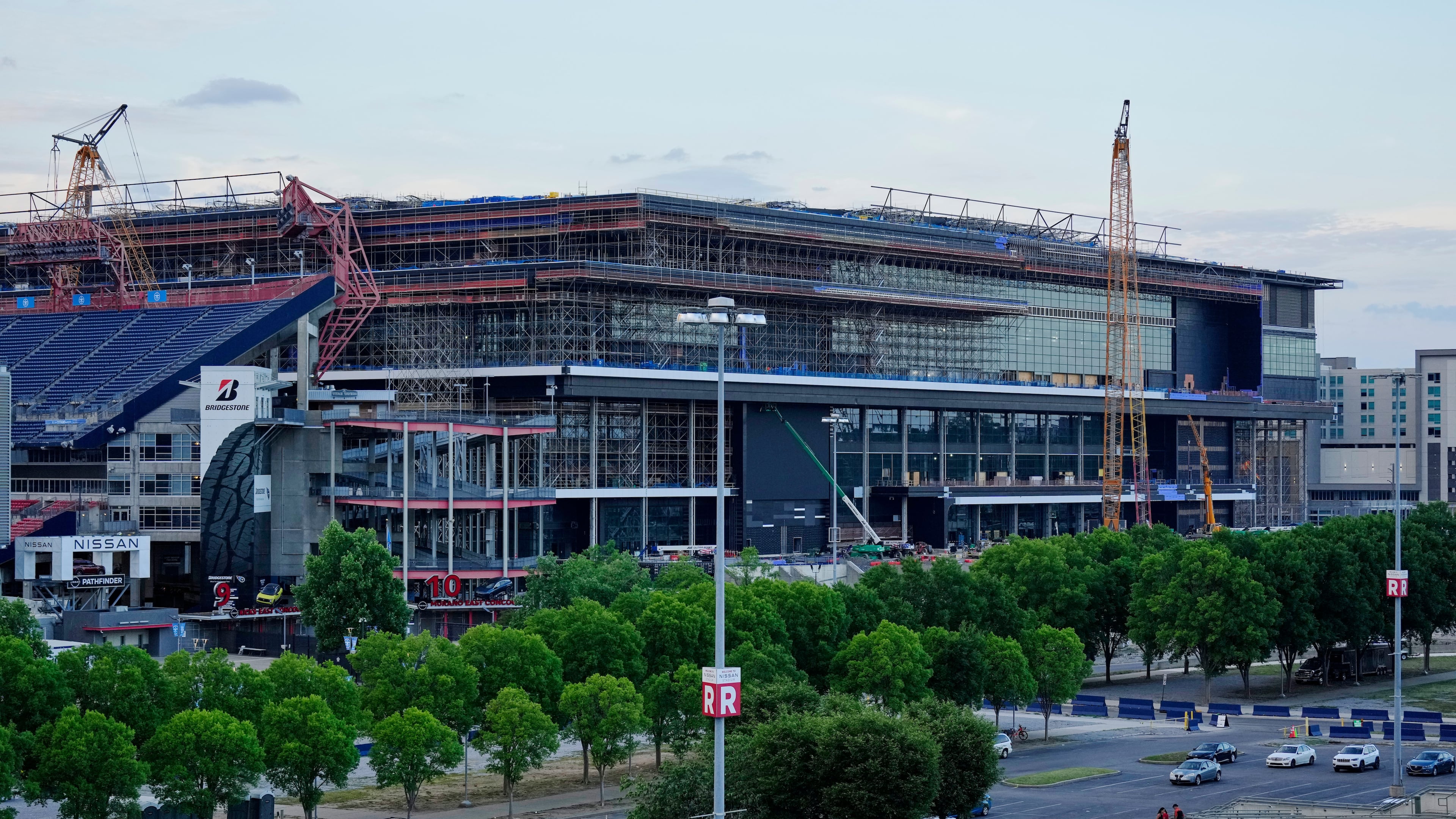 FILE - Construction continues on a new enclosed stadium for the Tennessee Titans NFL football team Monday, May 18, 2026, in Nashville, Tenn. (AP Photo/George Walker IV, File)
