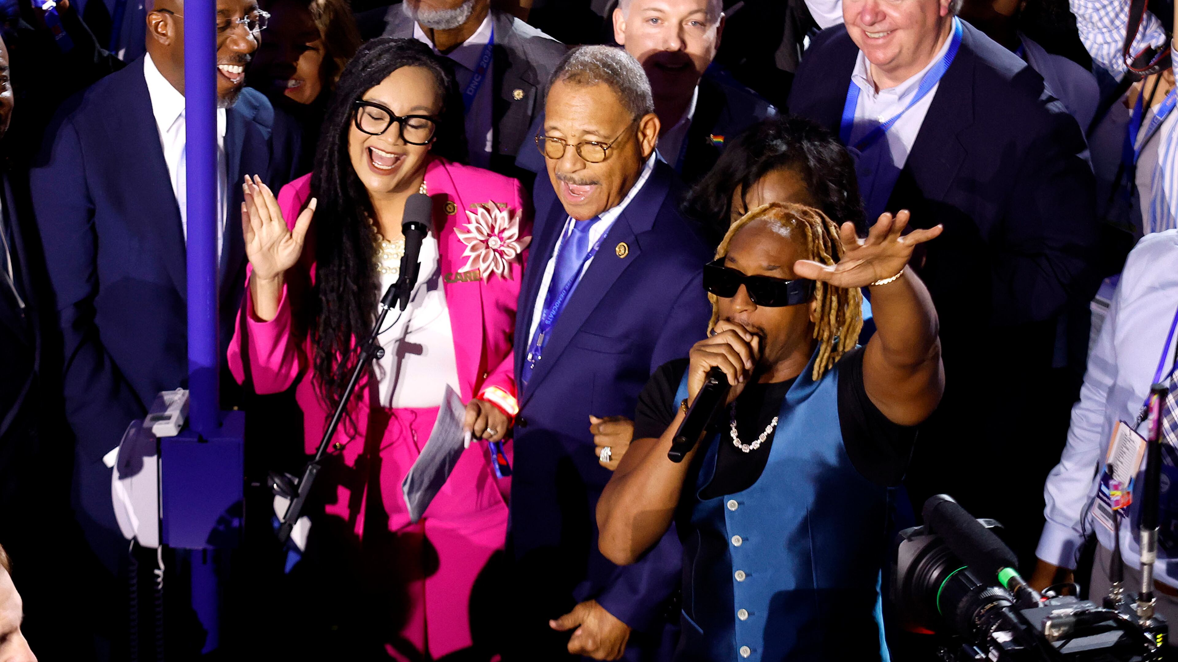 Rapper Lil Jon, right, performs with the Georgia delegation during the Ceremonial Roll Call of States on the second day of the Democratic National Convention at the United Center on Tuesday, Aug. 20, 2024, in Chicago. (Chip Somodevilla/Getty Images/TNS)
