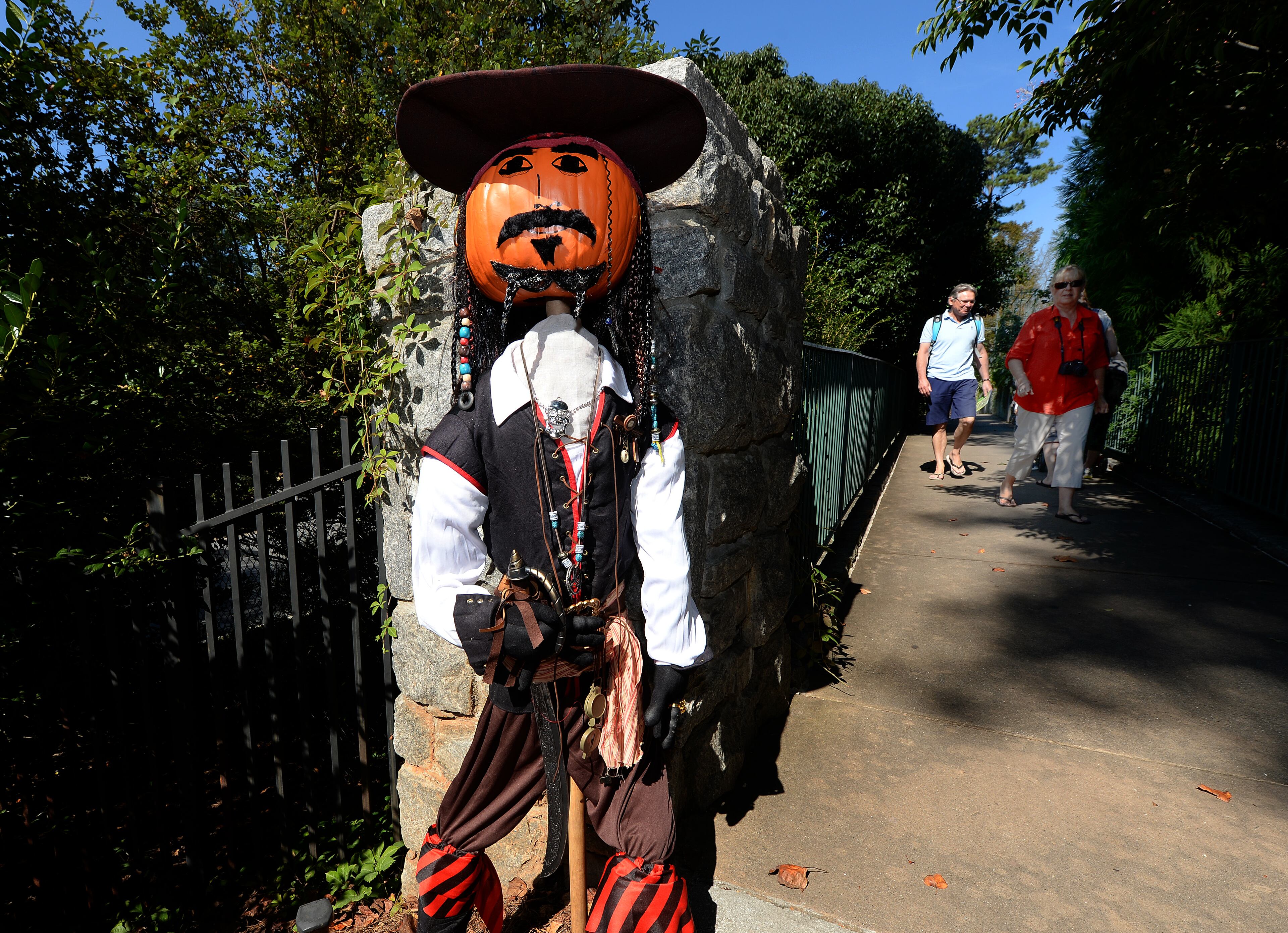Dunwoody Baptist Pre-School's Captain Jack Scarerow greets visitors walking to and from The Children's Garden at the Atlanta Botanical Garden on Wednesday, October 2, 2013. This was one of over 125 scarecrows hand crafted by businesses, individuals, schools and organizations. The creative scarecrows share the stage with the larger than life plant creatures of Imaginary Worlds. JOHNNY CRAWFORD / JCRAWFORD@AJC.COM JOHNNY CRAWFORD / JCRAWFORD@AJC.COM