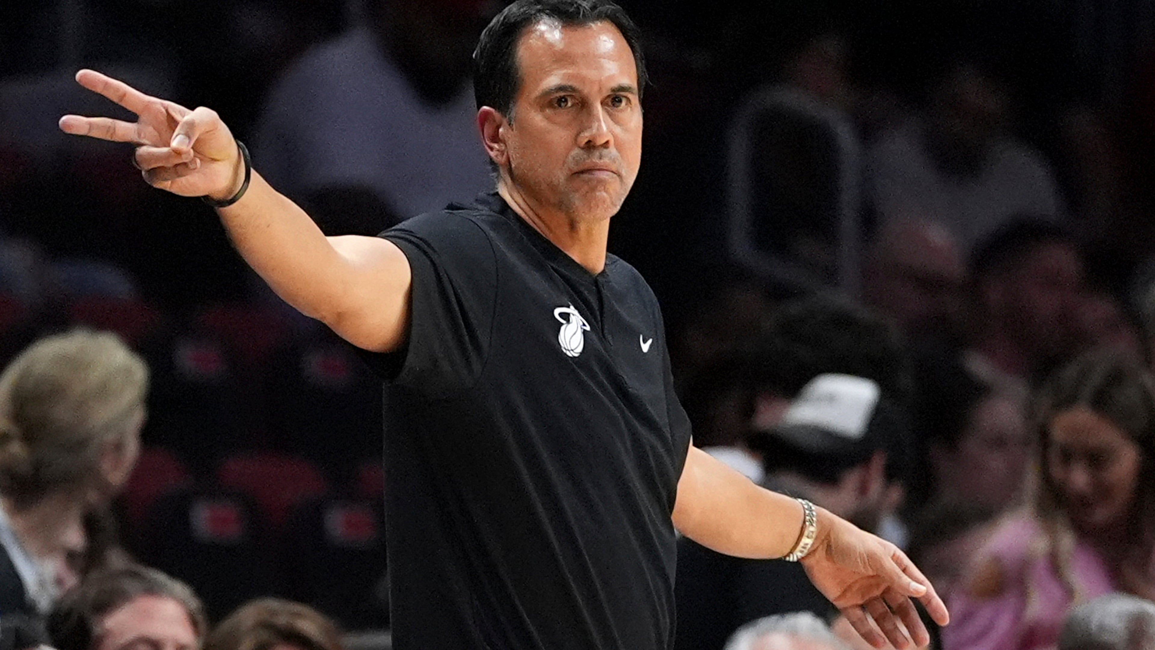 Miami Heat head coach Erik Spoelstra gestures from courtside during the first half of an NBA basketball game against the Phoenix Suns, Tuesday, Jan. 13, 2026, in Miami. (AP Photo/Rebecca Blackwell)