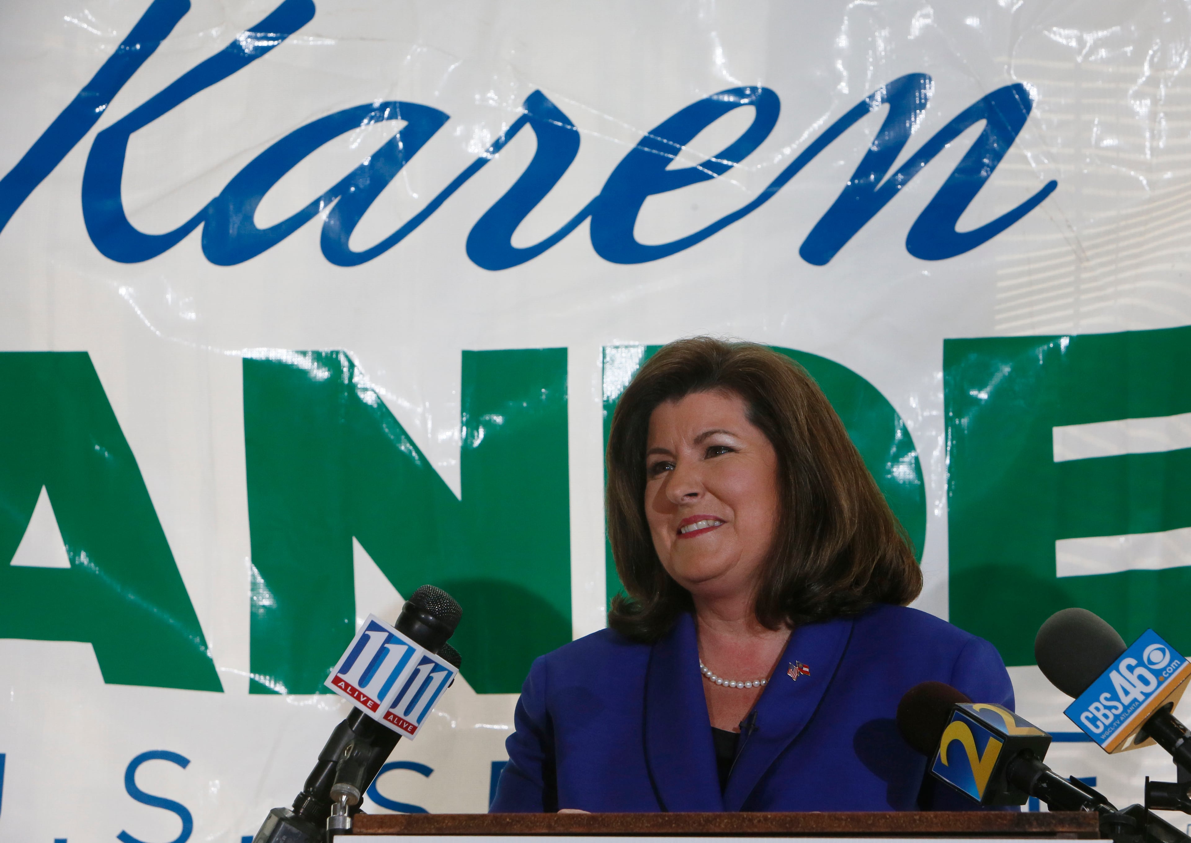 Karen Handel addresses the South Fulton Republican Women's monthly meeting. Former VP contender Sarah Palin made a surprise appearance at an event for Senate candidate Karen Handel, who is seeking traction in the crowded GOP contest. Palin campaigned for Handel at at the South Fulton Republican Women's monthly meeting. BOB ANDRES / BANDRES@AJC.COM