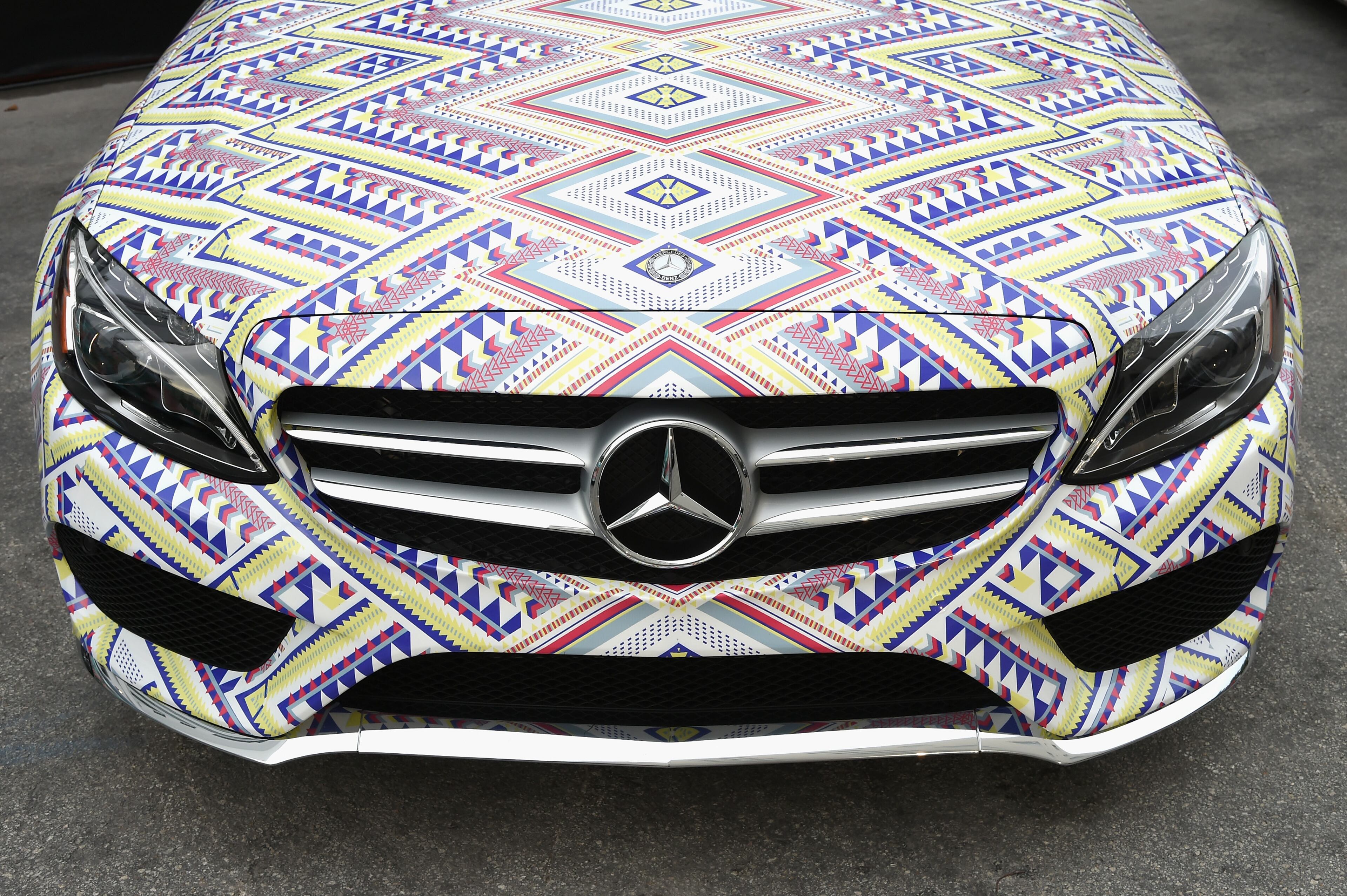 MIAMI BEACH, FL - JULY 17: A 2015 Mercedes-Benz C-Class featuring an exclusive design by L Space By Monica Wise on display during Mercedes-Benz Fashion Week Swim 2015 at The Raleigh on July 17, 2014 in Miami Beach, Florida. (Photo by Andrew H. Walker/Getty Images for Mercedes-Benz Fashion Week )