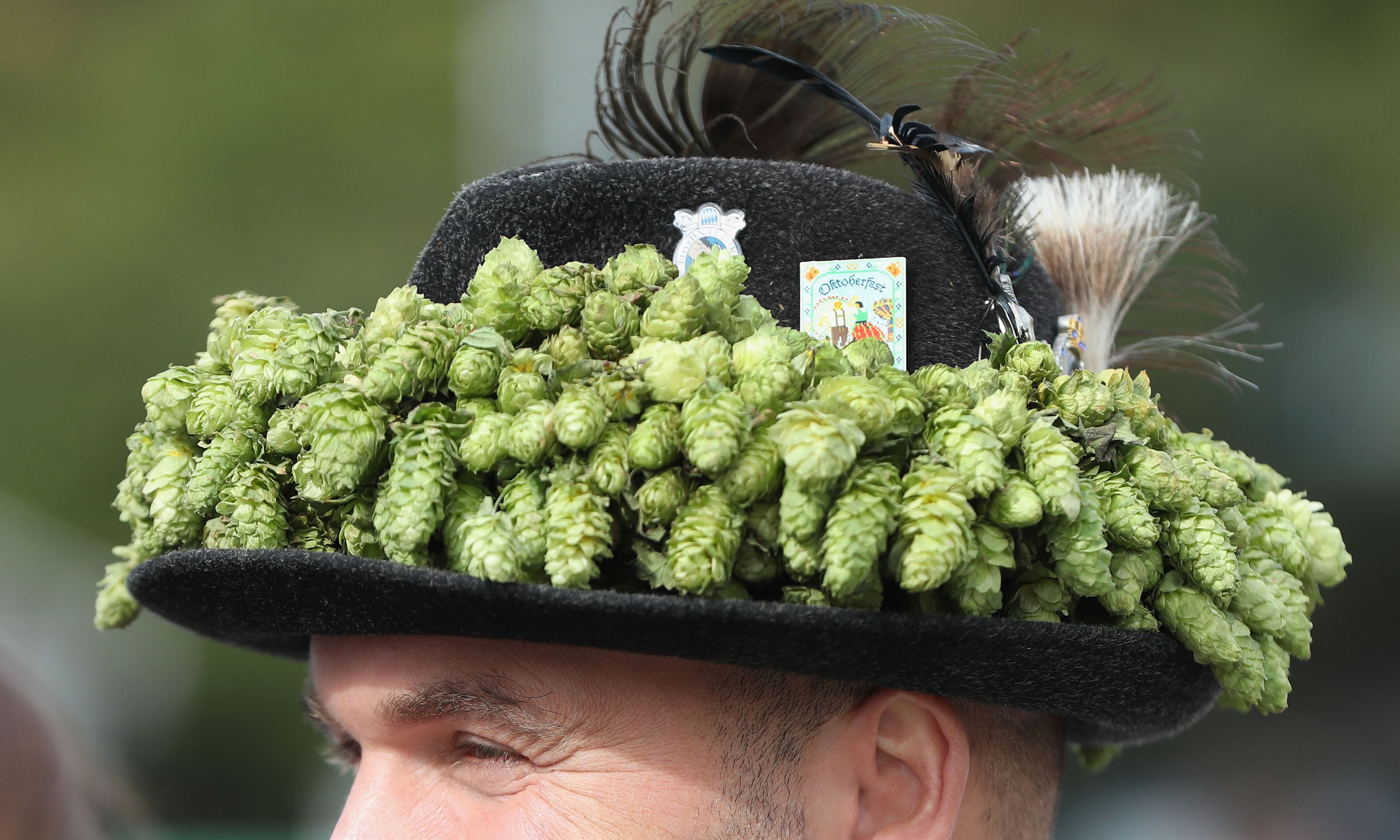 MUNICH, GERMANY - SEPTEMBER 22: A visitor in traditional Bavarian outfit is pictured at the opening day of the 2018 Oktoberfest beer festival on September 22, 2018 in Munich, Germany. The Oktoberfest lasts until October 7 and is the world's largest beer festival. The beer festival typically draws over six million visitors. (Photo by Alexandra Beier/Getty Images)