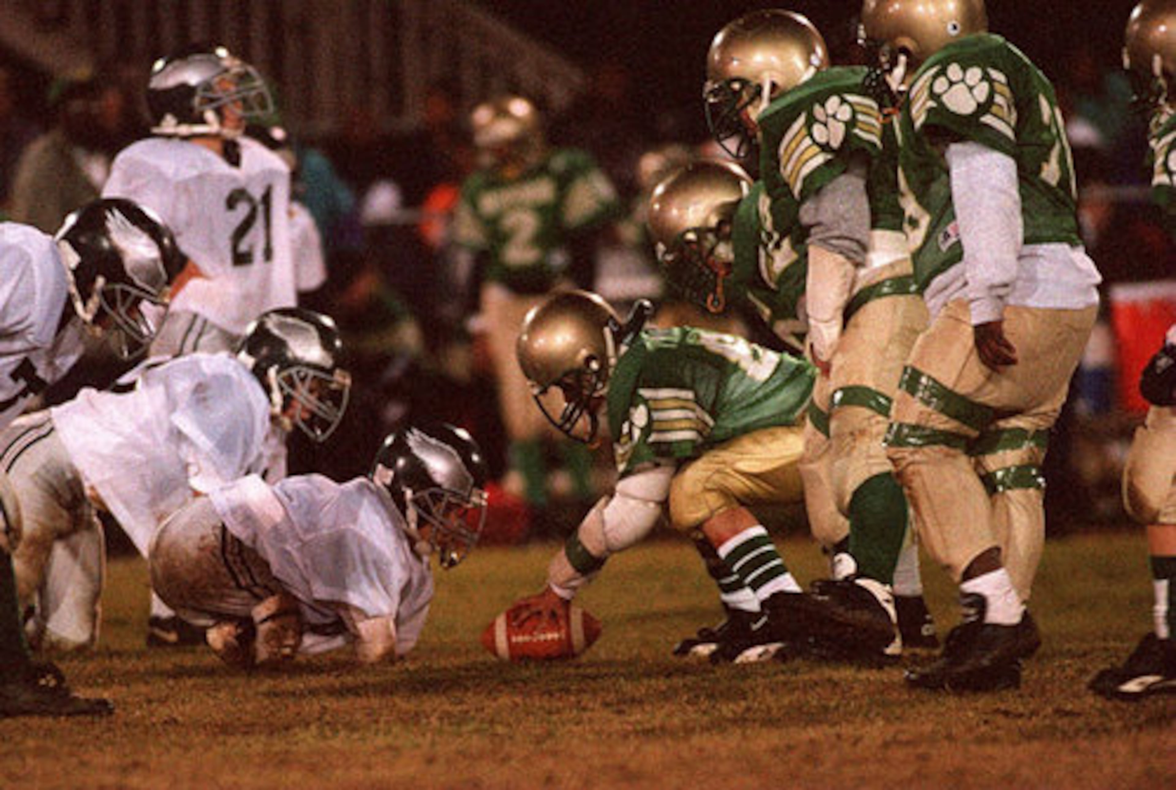 Here Maynard plays nose tackle in a youth league in this 1997 photo.