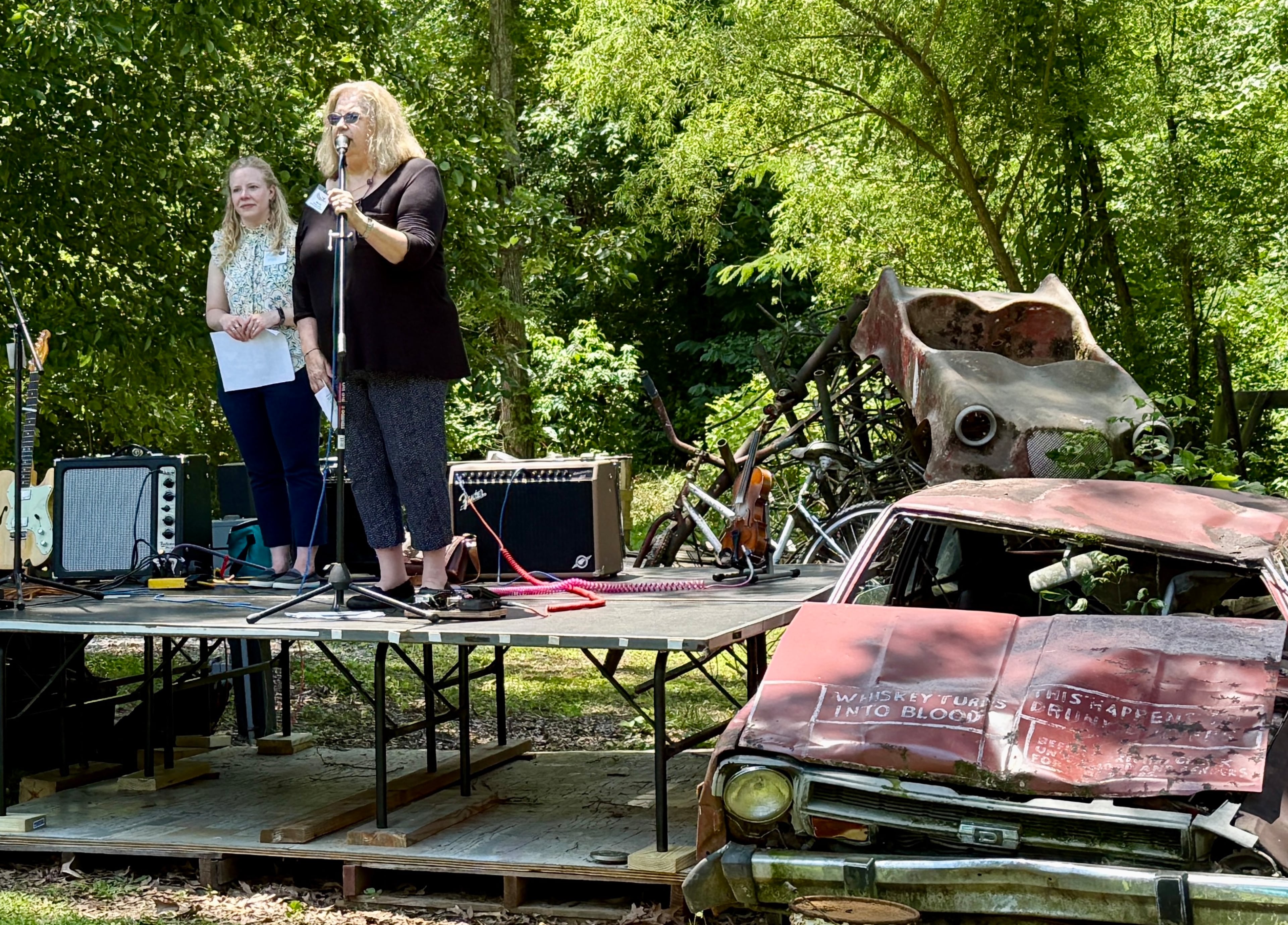 Tina Cox, executive director of Paradise Garden Foundation (right), and architect Sarah Pitts on stage during the grand opening celebration for The World Folk Art Church on June 21, 2025.
Danielle Charbonneau/AJC