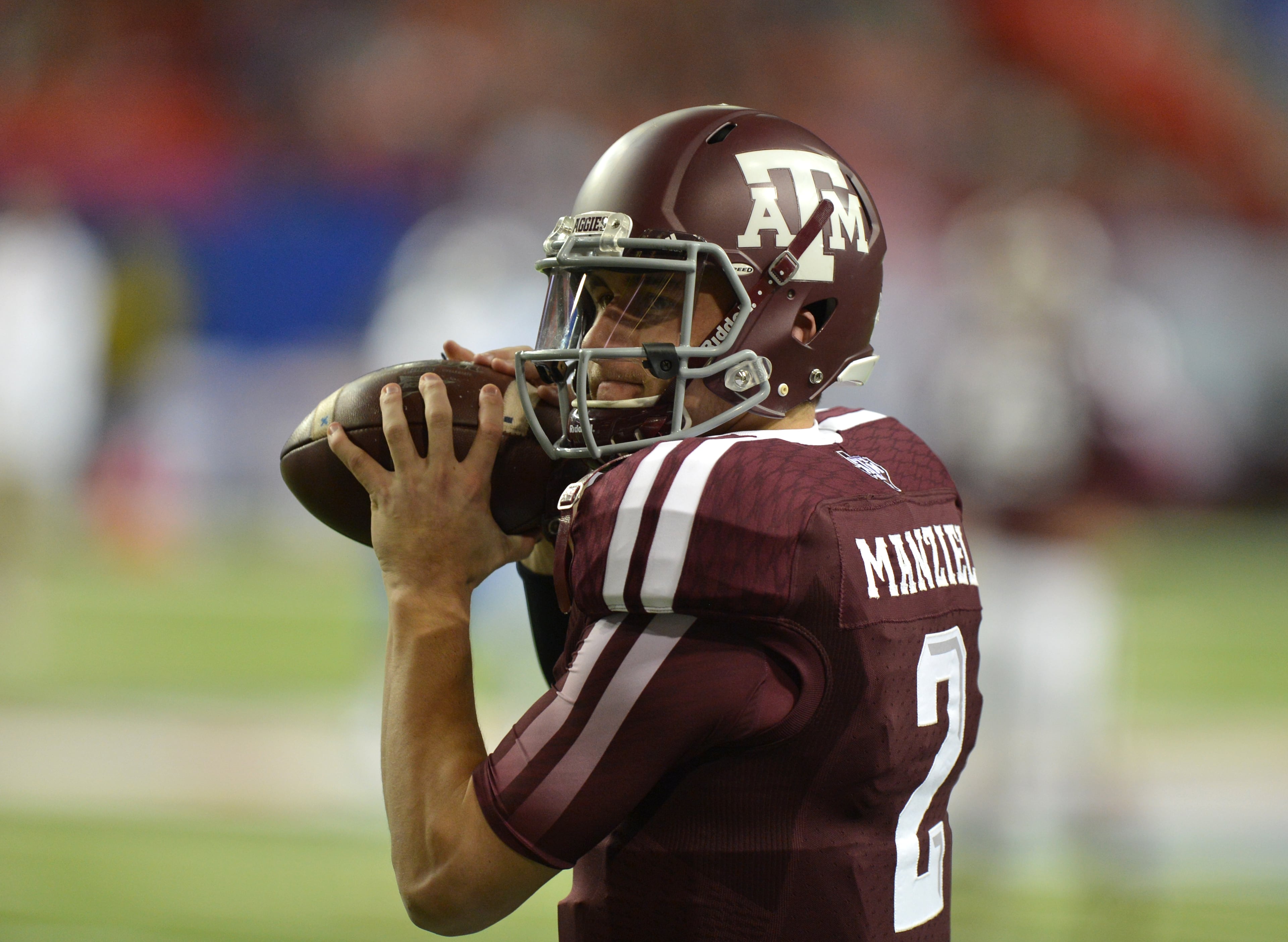 Texas A&M quarterback Johnny Manziel during pre-game warms up Tuesday December 31, 2013. Texas A&M takes on Duke in the Chick-fil-A Bowl.