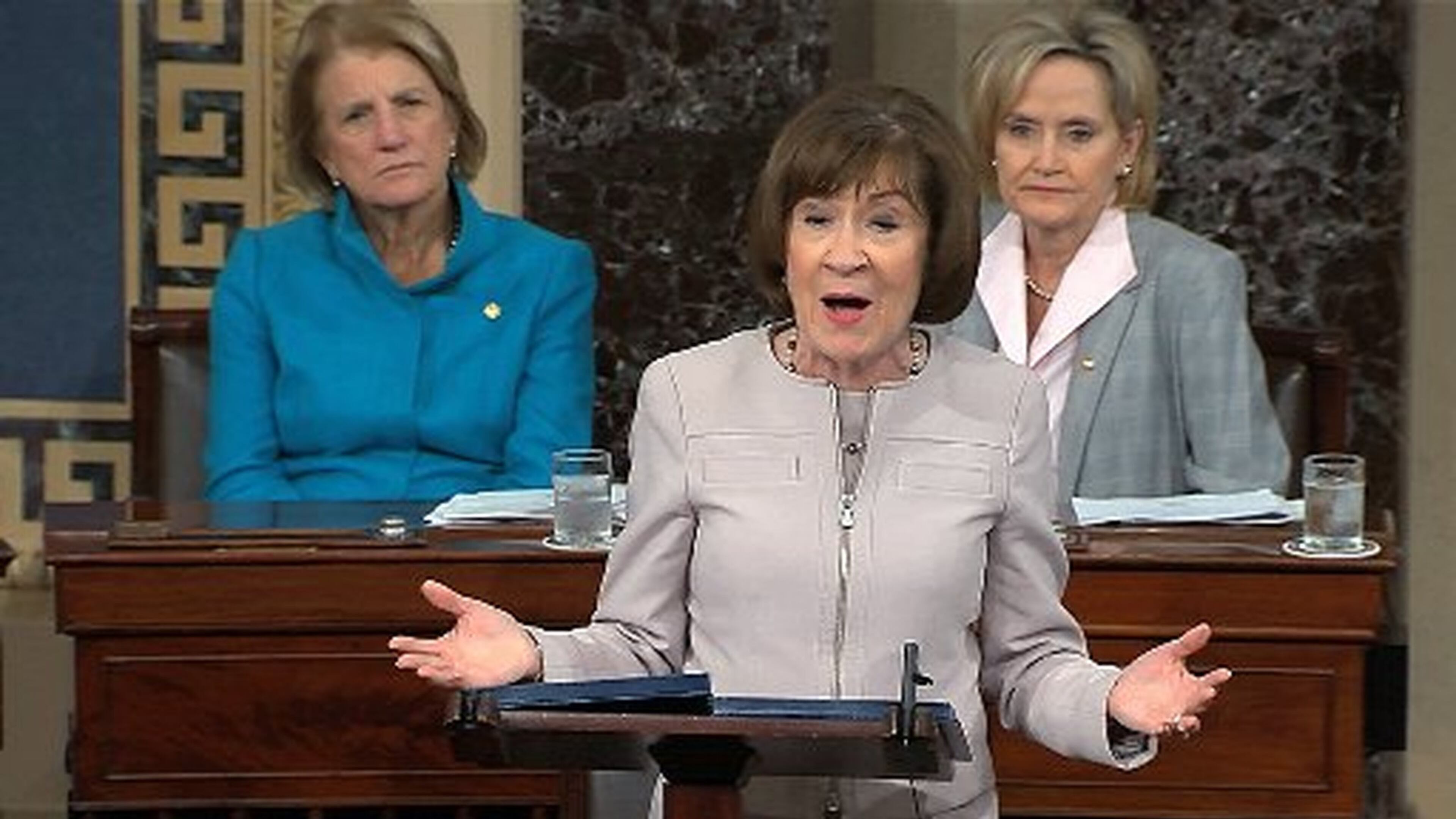 In this image from video provided by Senate TV, Sen. Susan Collins, R-Maine, speaks on the Senate floor about her vote on Supreme Court nominee Judge Brett Kavanaugh on Oct. 5, 2018, in the Capitol in Washington. Sitting behind her are Sen. Shelley Capito (left), R-W.Va., and Sen. Cindy Hyde-Smith (right), R-Miss. SENATE TV VIA AP