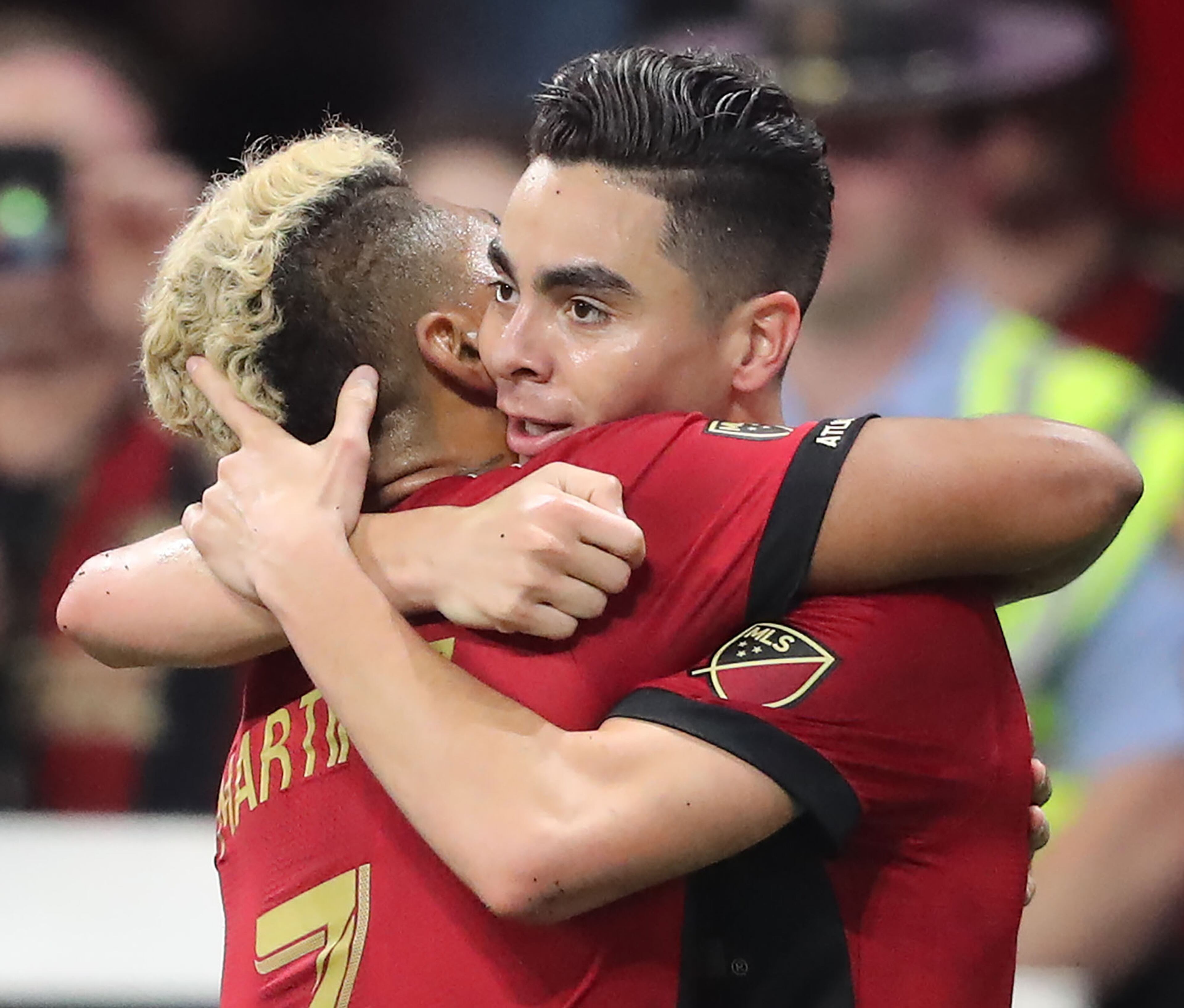 March 11, 2018 Atlanta: Atlanta United midfielder Miguel Almiron and forward Josef Martinez celebrate Almironââ¬â¢s goal against D.C. United for a 2-0 lead during the second half in a MLS soccer match on Sunday, March 11, 2018, in Atlanta. Martinez scored the first goal of the game on the way to a 3-1 victory in the home opener. Curtis Compton/ccompton@ajc.com