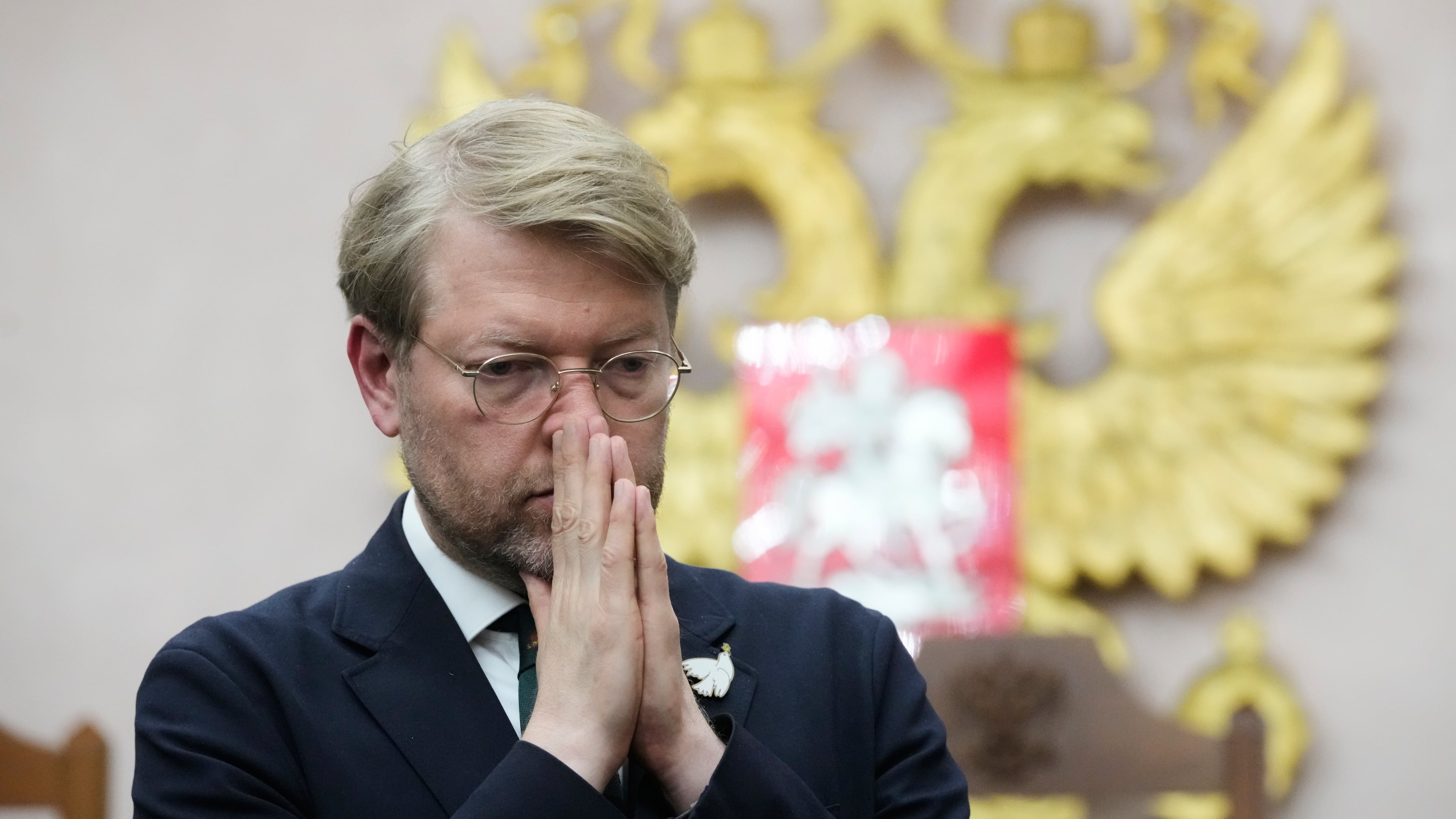 Yabloko party leader Nikolai Rybakov stands after a hearing on a lawsuit to bar the party from the upcoming parliamentary elections, at the Russia's Supreme Court, in Moscow, Monday, Aug. 10, 2026. (AP Photo/Pavel Bednyakov)