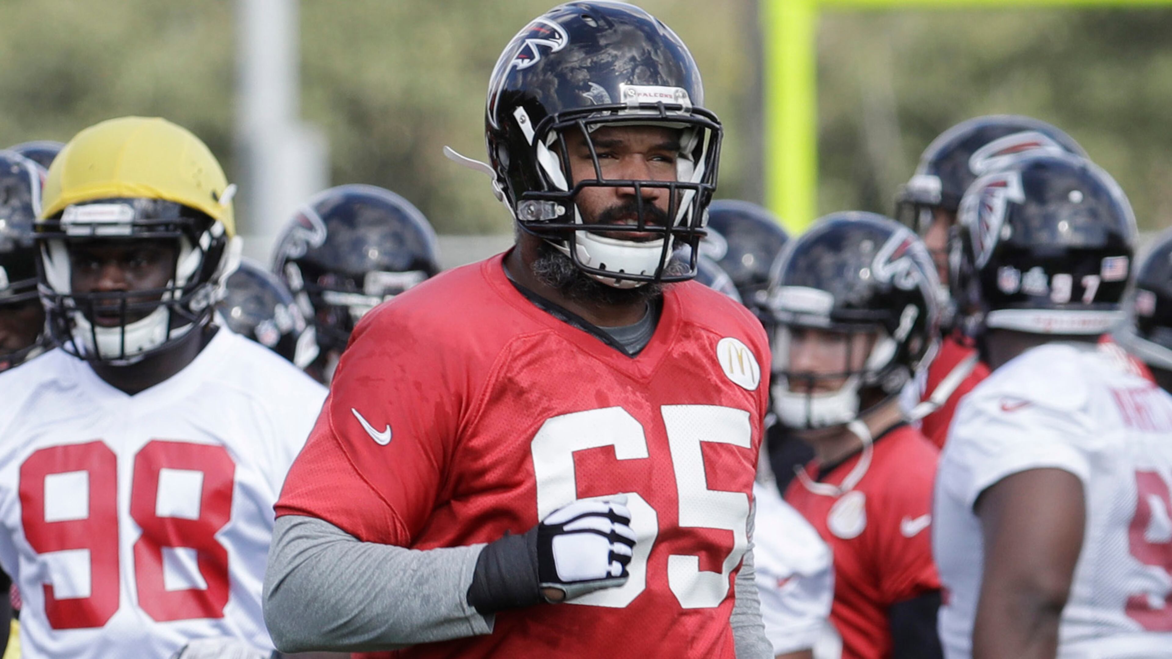 Atlanta Falcons offensive guard Chris Chester (65) and teammates break from a team huddle during a practice for the NFL Super Bowl 51 football game Wednesday, Feb. 1, 2017, in Houston. Atlanta will face the New England Patriots in the Super Bowl Sunday. (AP Photo/Eric Gay)