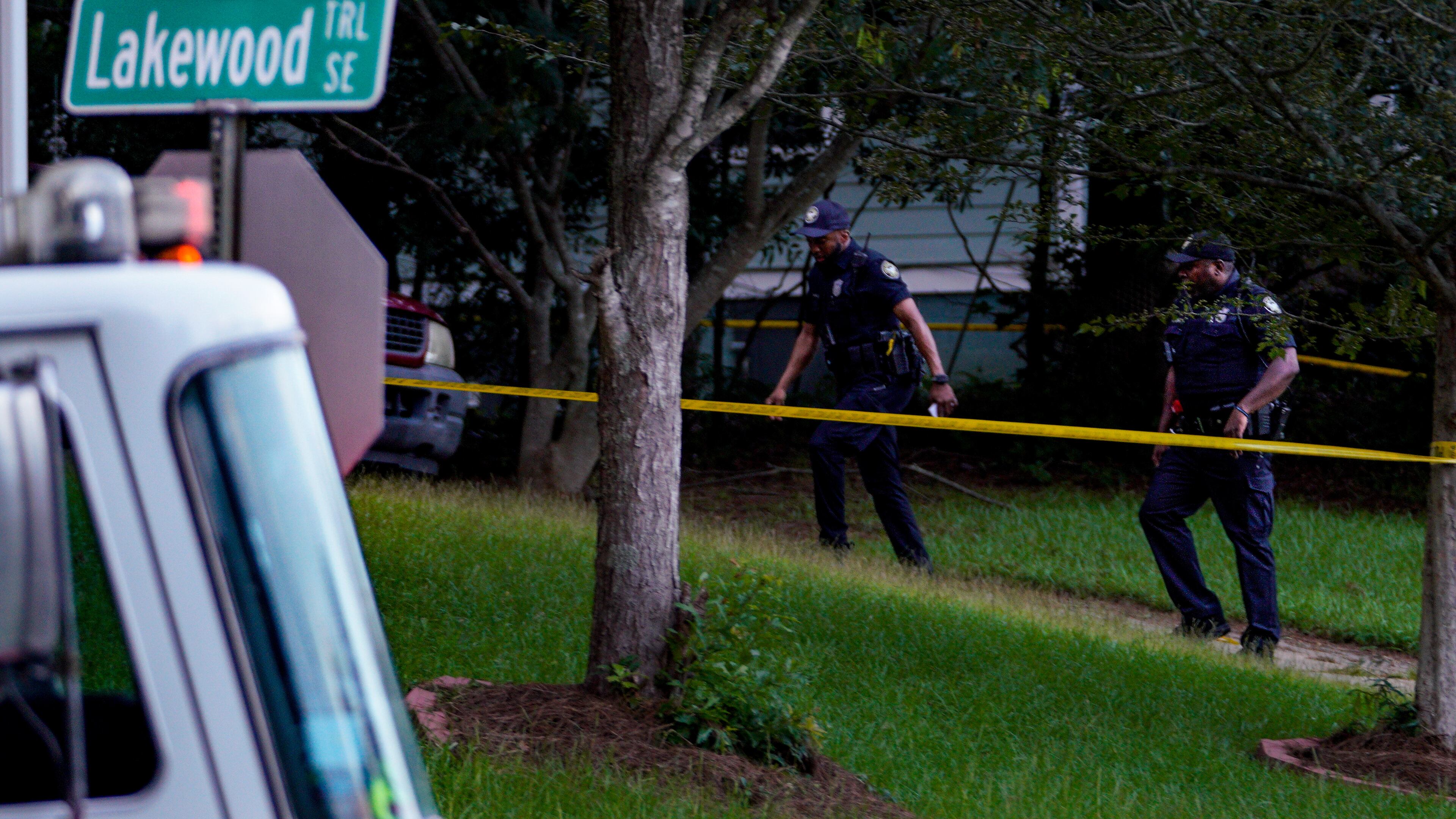 Atlanta police officers investigate a fatal shooting on Wyndham Way on Sunday evening. According to police, a 65-year-old man was killed at a home.
